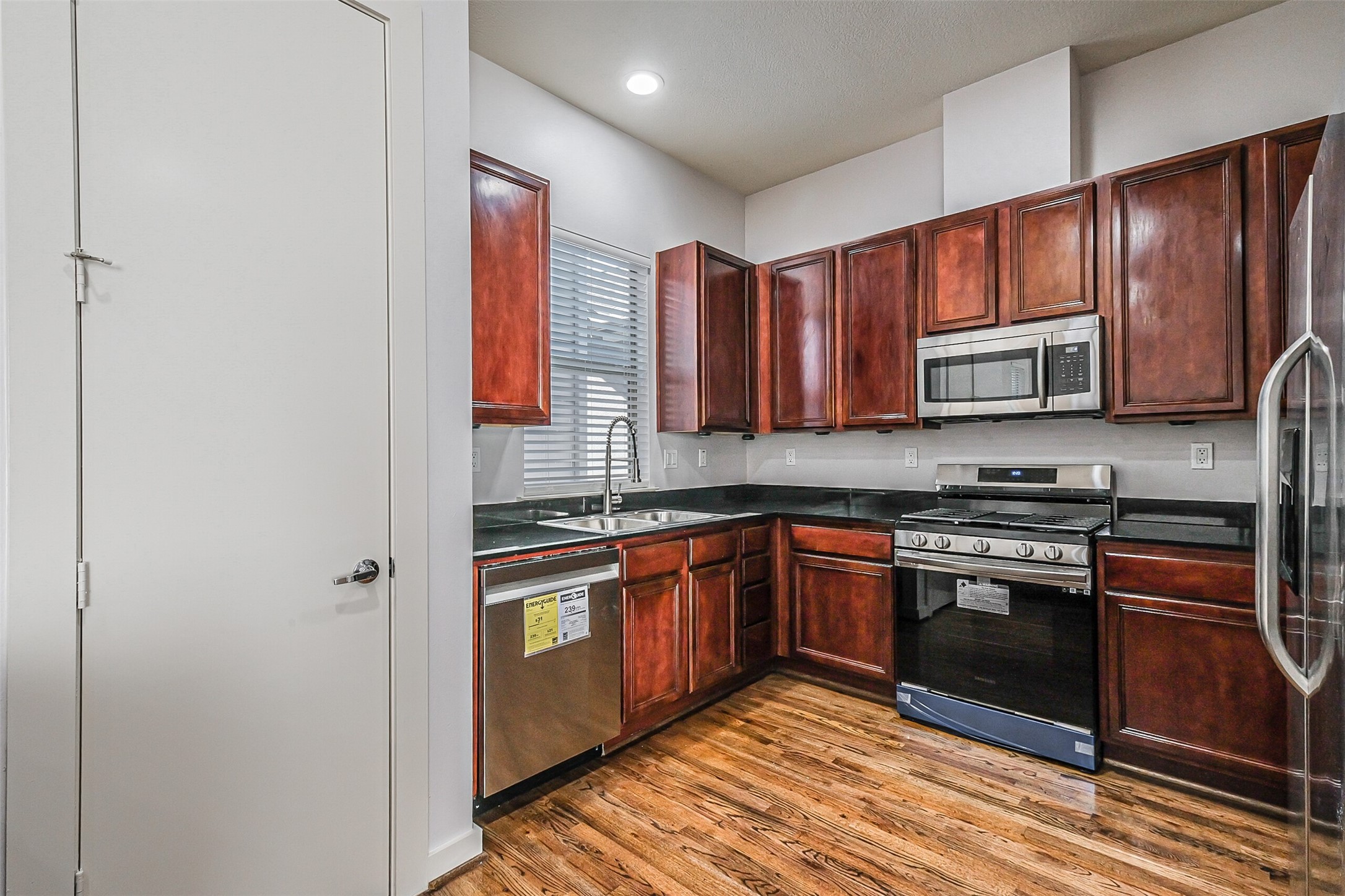 Beautiful cabinets with red oak stain - If you have additional questions regarding 4336 Center Street  in Houston or would like to tour the property with us call 800-660-1022 and reference MLS# 24798932.