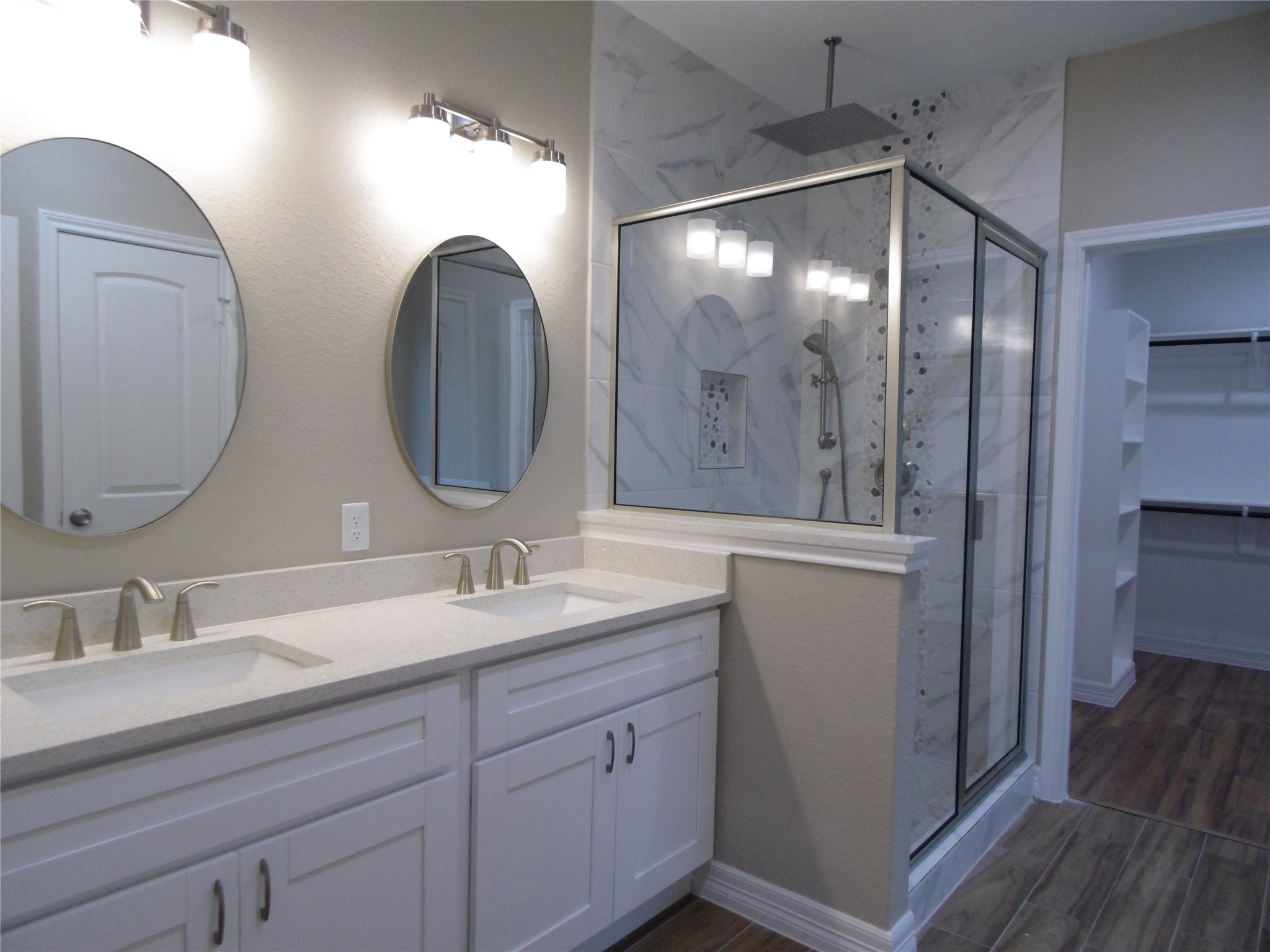 2713 Vega St primary bathroom with shower and walk-in closet. - If you have additional questions regarding 2713 Vega Street  in Houston or would like to tour the property with us call 800-660-1022 and reference MLS# 3088033.