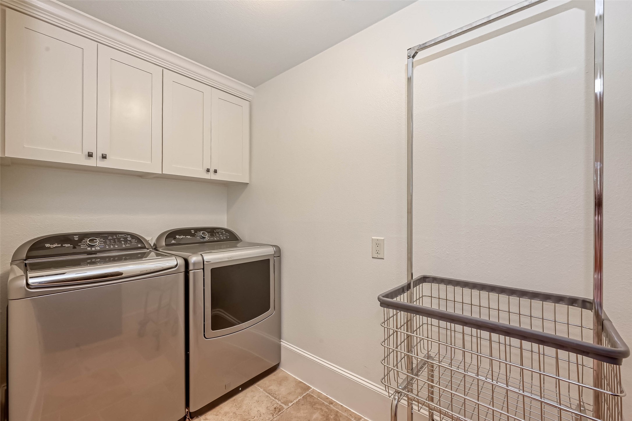 Laundry room on the 1st floor which includes a laundry chute - If you have additional questions regarding 6606 Rodrigo Street  in Houston or would like to tour the property with us call 800-660-1022 and reference MLS# 74006082.