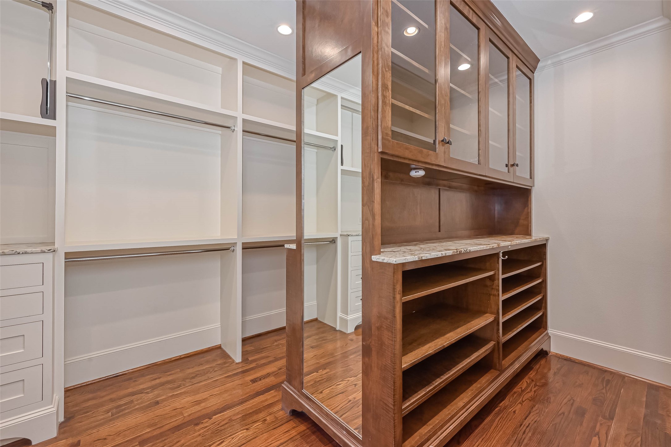 Another view of the primary closet - If you have additional questions regarding 6606 Rodrigo Street  in Houston or would like to tour the property with us call 800-660-1022 and reference MLS# 74006082.