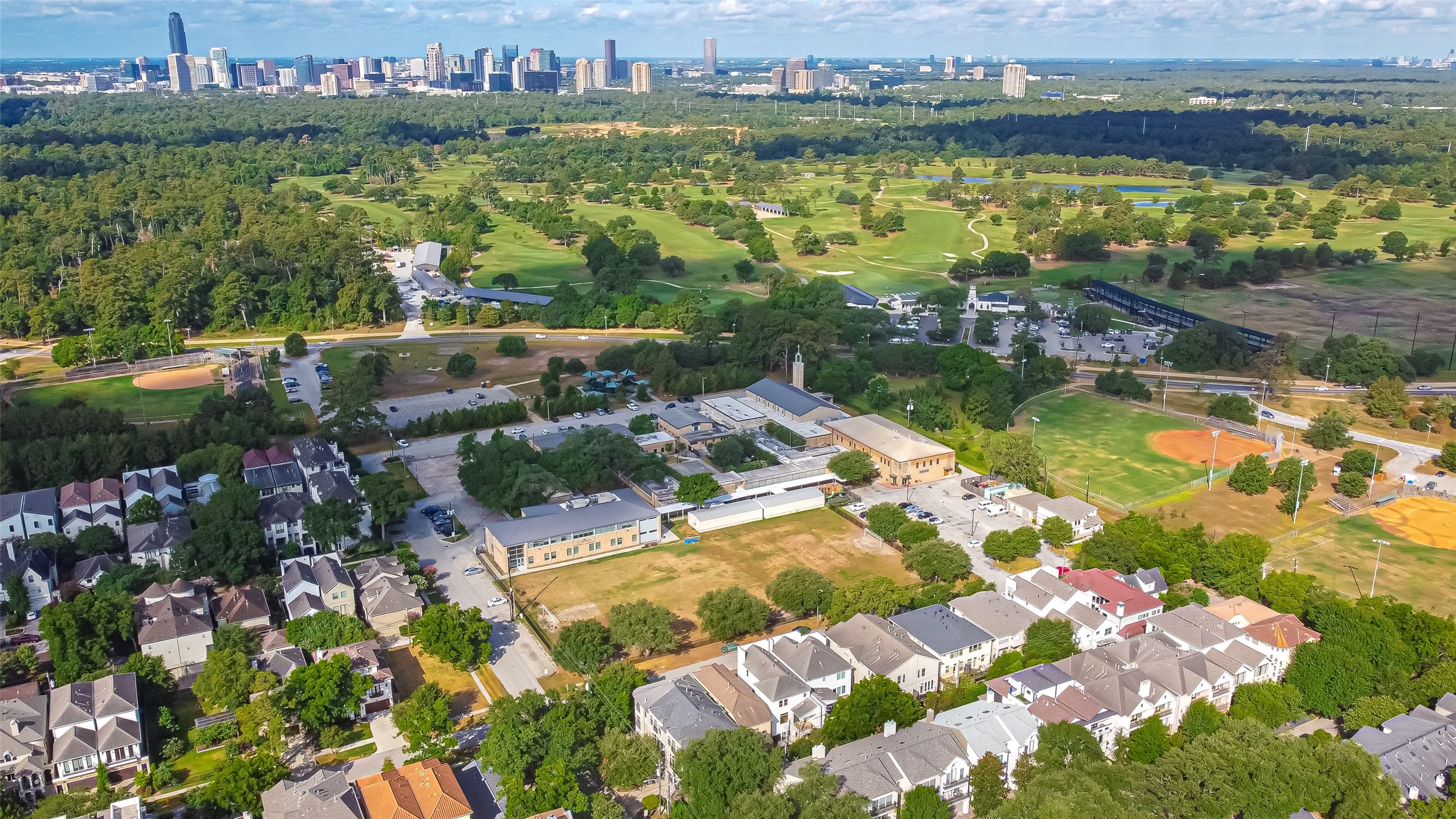 AERIAL VIEW OF THE, SCHOOL AND MEMORIAL PARK - If you have additional questions regarding 6606 Rodrigo Street  in Houston or would like to tour the property with us call 800-660-1022 and reference MLS# 74006082.
