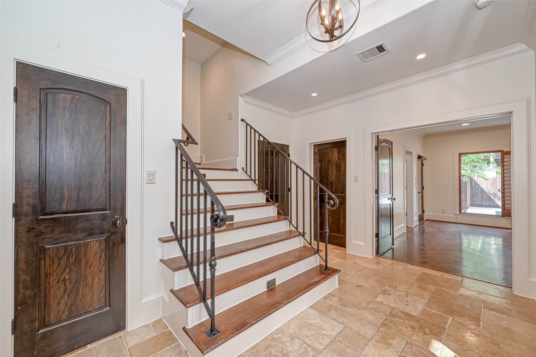 Another view of the entry towards the downstairs bedroom that leads to the outdoors - If you have additional questions regarding 6606 Rodrigo Street  in Houston or would like to tour the property with us call 800-660-1022 and reference MLS# 74006082.