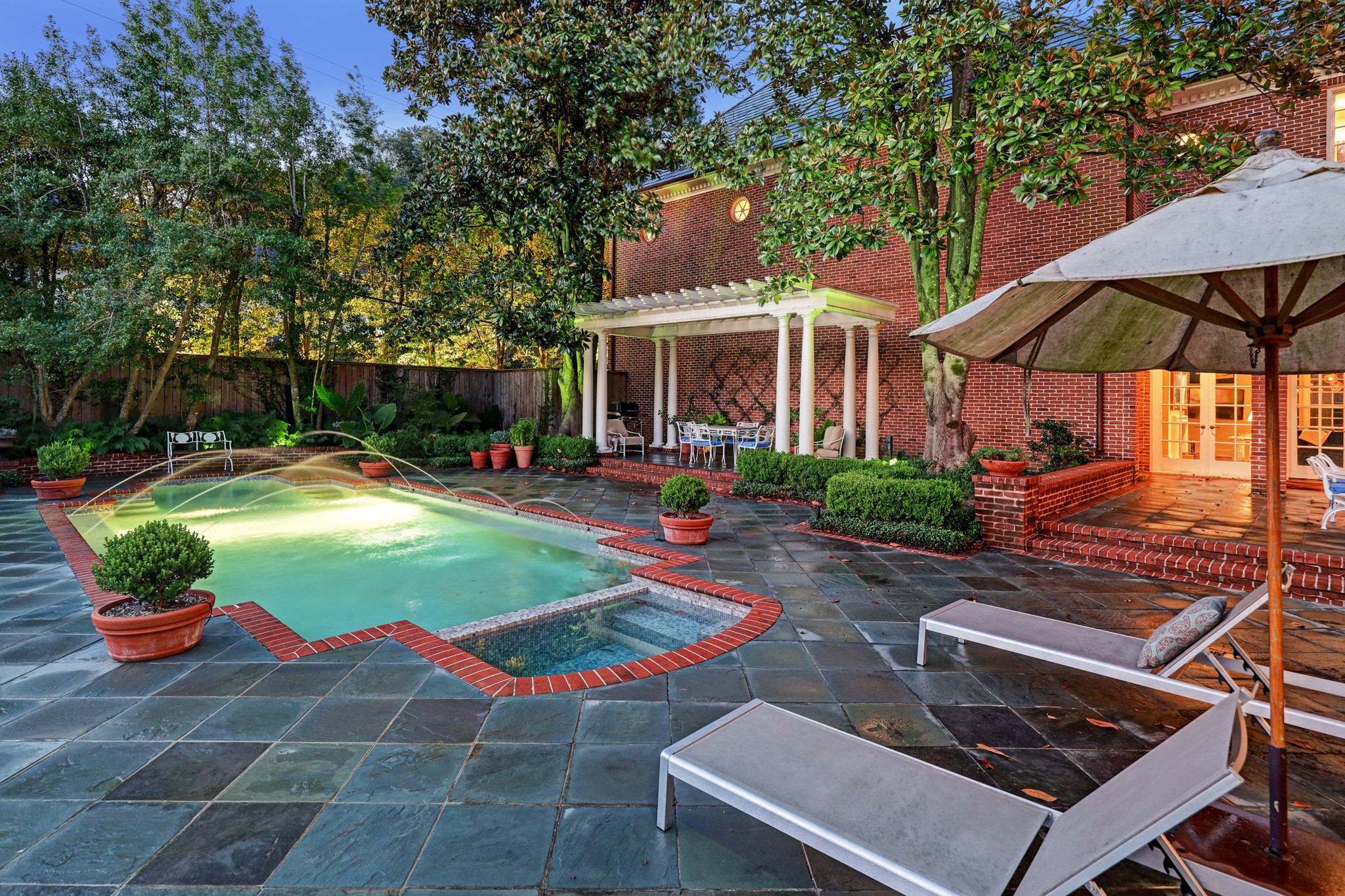 The eloquently designed pool and its attached spa is surrounded by the elevated terrace with a Pergola that is perfect for outdoor entertaining. - If you have additional questions regarding 3320 Chevy Chase Drive  in Houston or would like to tour the property with us call 800-660-1022 and reference MLS# 69622228.