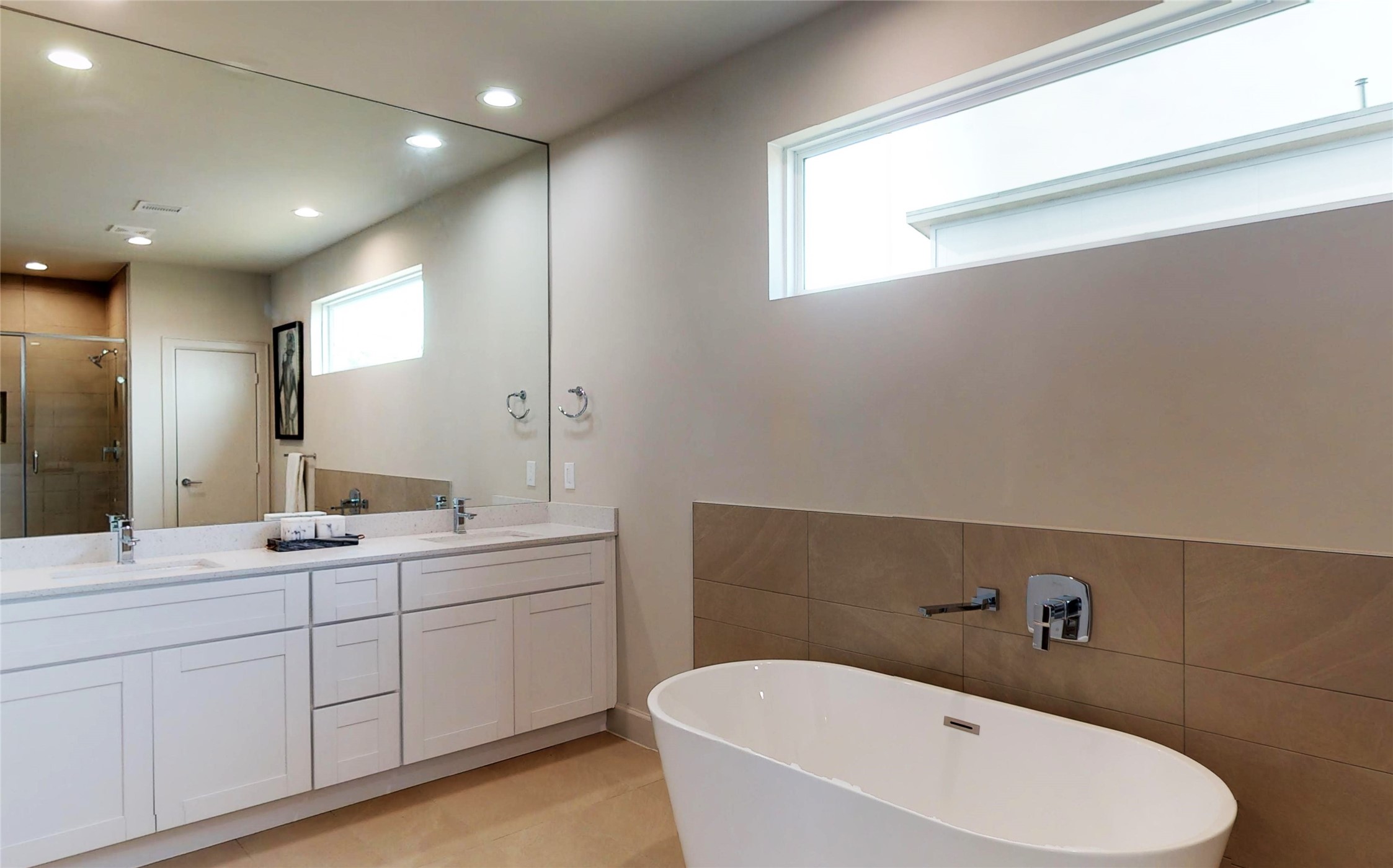 Dual vanity and plenty of sunlight in the primary bathroom. - If you have additional questions regarding 5703 Pampero Lane  in Houston or would like to tour the property with us call 800-660-1022 and reference MLS# 22669008.