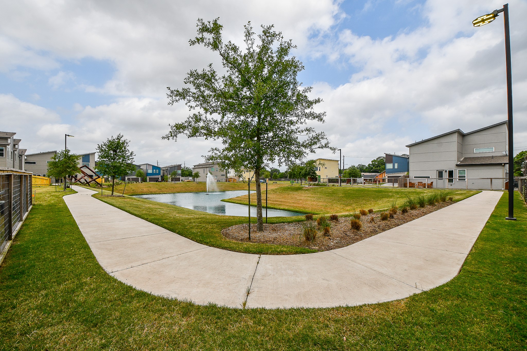 Another view of the running trail surrounding the pond. - If you have additional questions regarding 5703 Pampero Lane  in Houston or would like to tour the property with us call 800-660-1022 and reference MLS# 22669008.