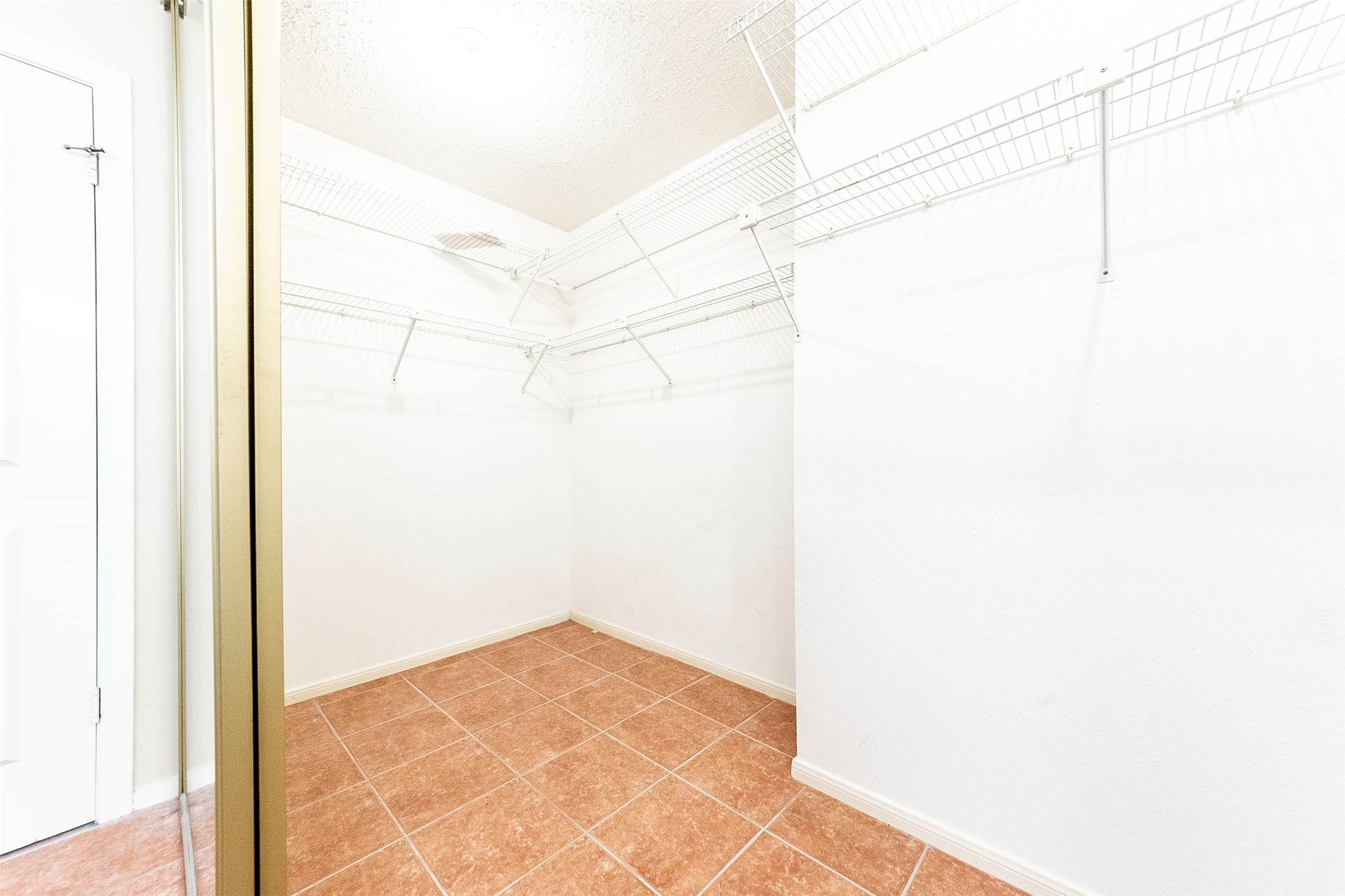 Walk-in closet in Primary - If you have additional questions regarding 1607 Beaconshire Road  in Houston or would like to tour the property with us call 800-660-1022 and reference MLS# 64892069.