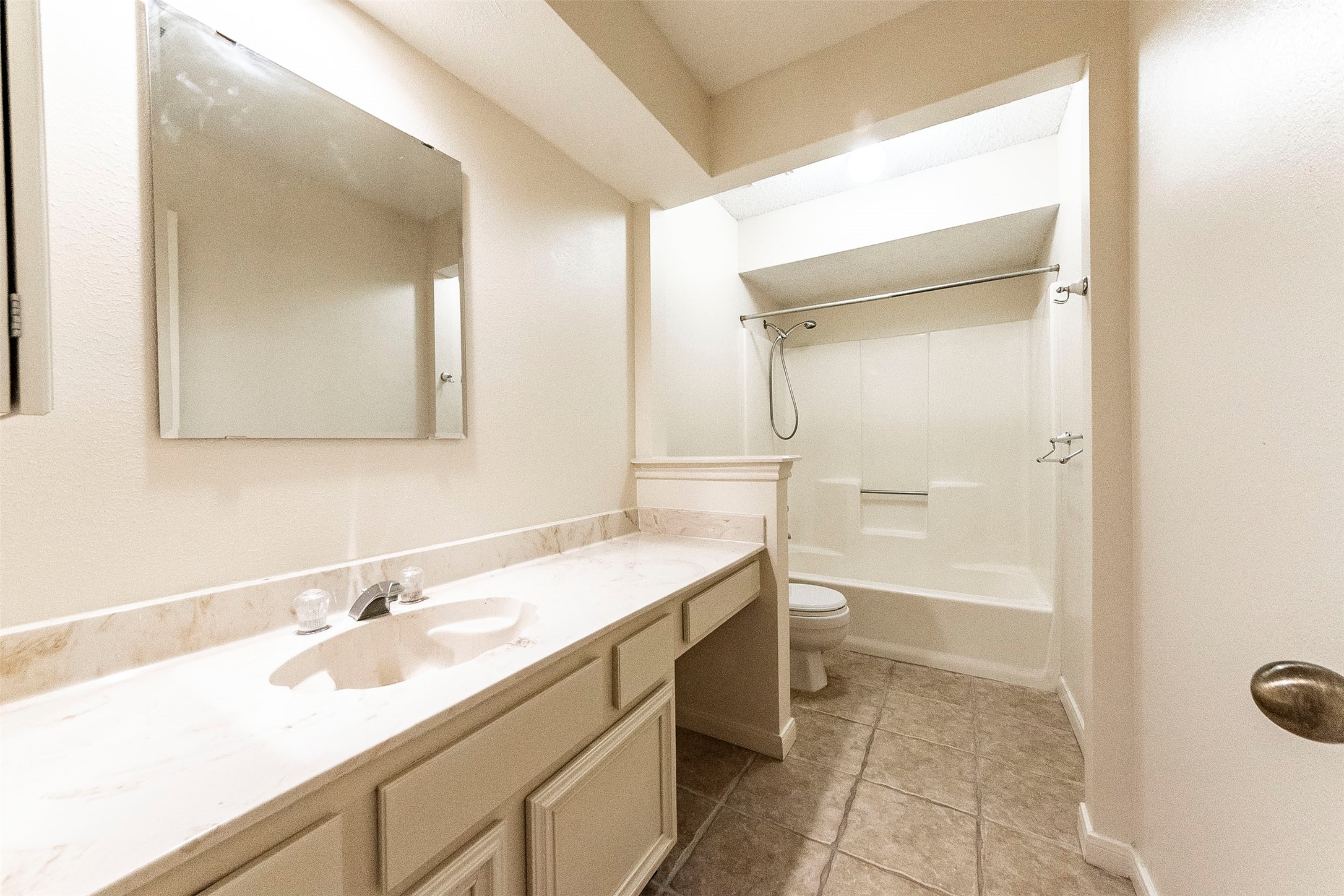 Upstairs secondary bath - If you have additional questions regarding 1607 Beaconshire Road  in Houston or would like to tour the property with us call 800-660-1022 and reference MLS# 64892069.