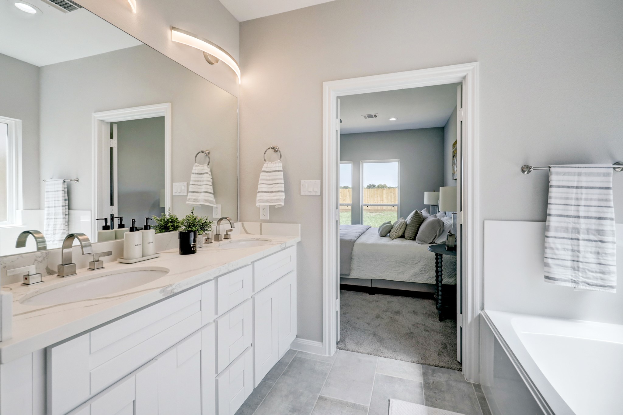 The primary bath of your dreams - stylish, luxurious and spacious. Picture is of the model home. - If you have additional questions regarding 8106 James Franklin Street  in Houston or would like to tour the property with us call 800-660-1022 and reference MLS# 70741946.