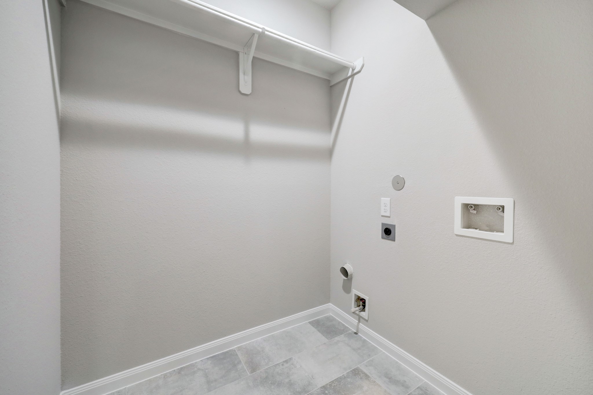 Utility room located on the first floor. Picture is of the model home. - If you have additional questions regarding 8106 James Franklin Street  in Houston or would like to tour the property with us call 800-660-1022 and reference MLS# 70741946.