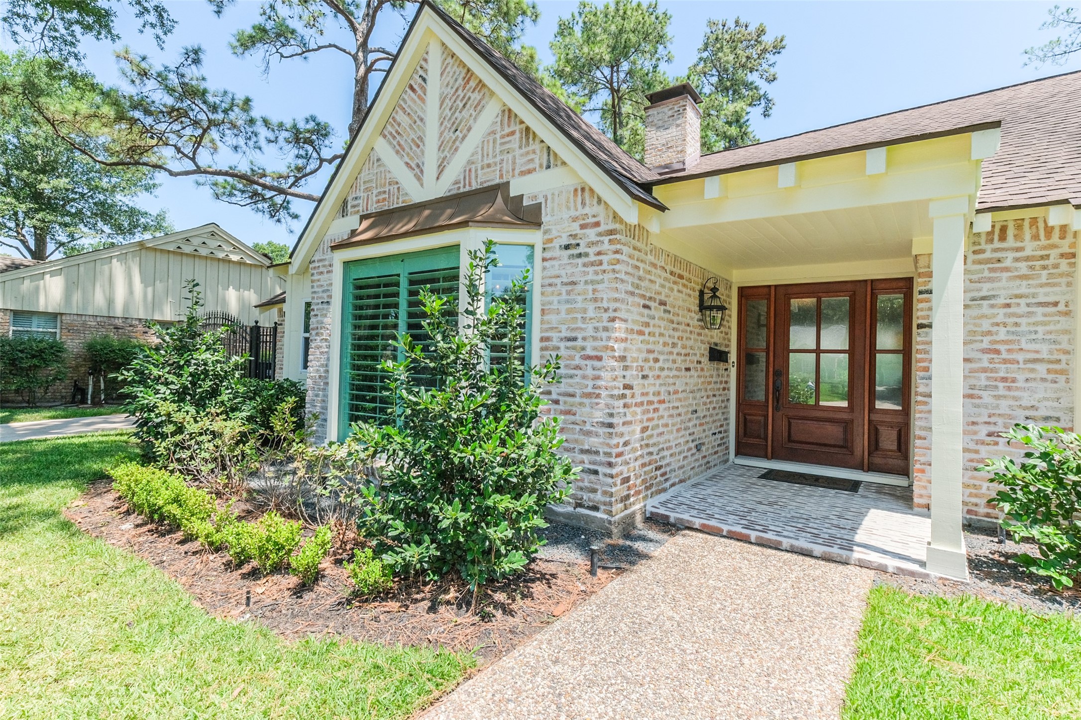 These owners replaced the front door and sidelights with this beautiful set of glass inset mahogany ones.  It very much freshens up the exterior as does the slurried brick treatment also accomplished by these owners. - If you have additional questions regarding 10018 Valley Forge Drive  in Houston or would like to tour the property with us call 800-660-1022 and reference MLS# 82370096.