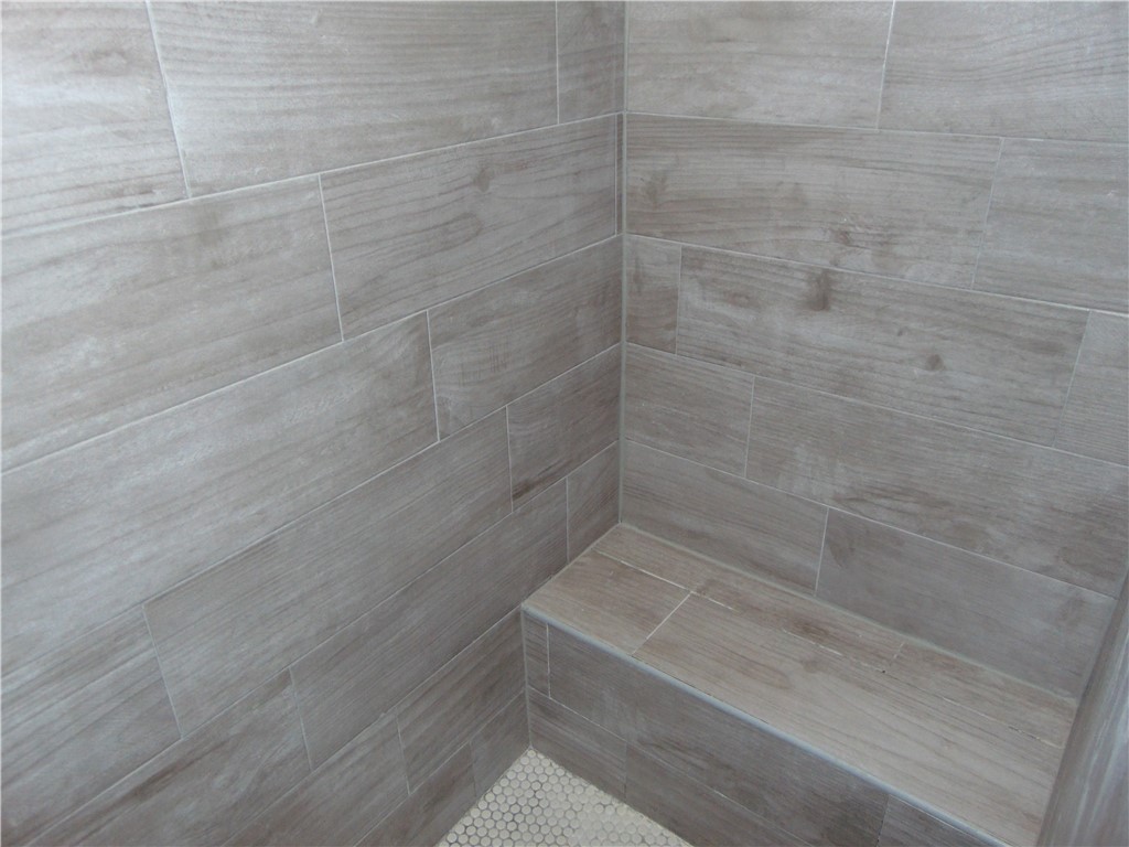Master Shower - If you have additional questions regarding 1113 E Kenedy Avenue  in Kingsville or would like to tour the property with us call 800-660-1022 and reference MLS# 404636.