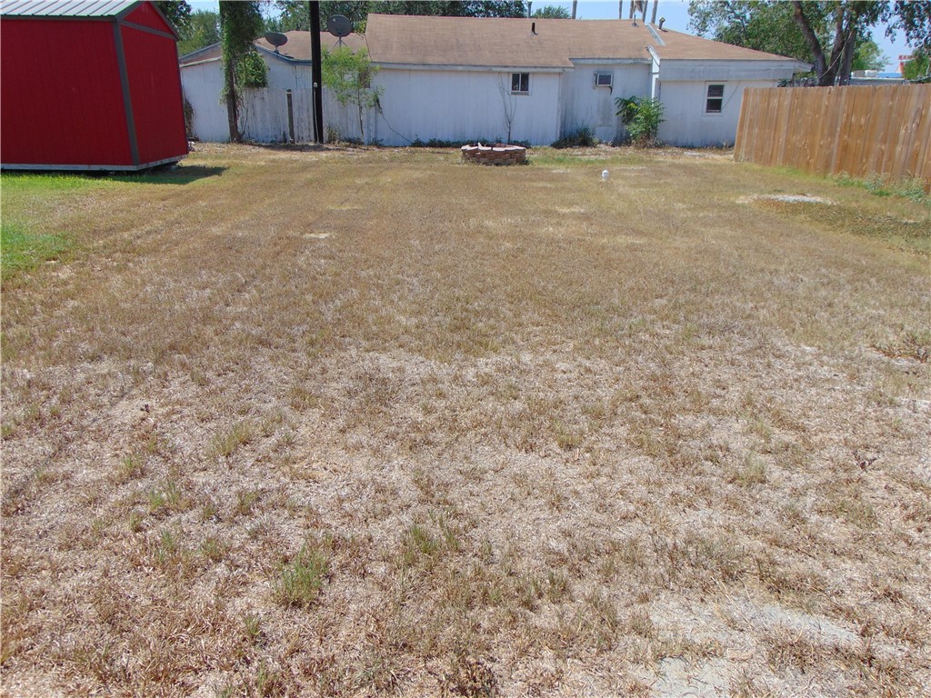 Back Yard - If you have additional questions regarding 1113 E Kenedy Avenue  in Kingsville or would like to tour the property with us call 800-660-1022 and reference MLS# 404636.