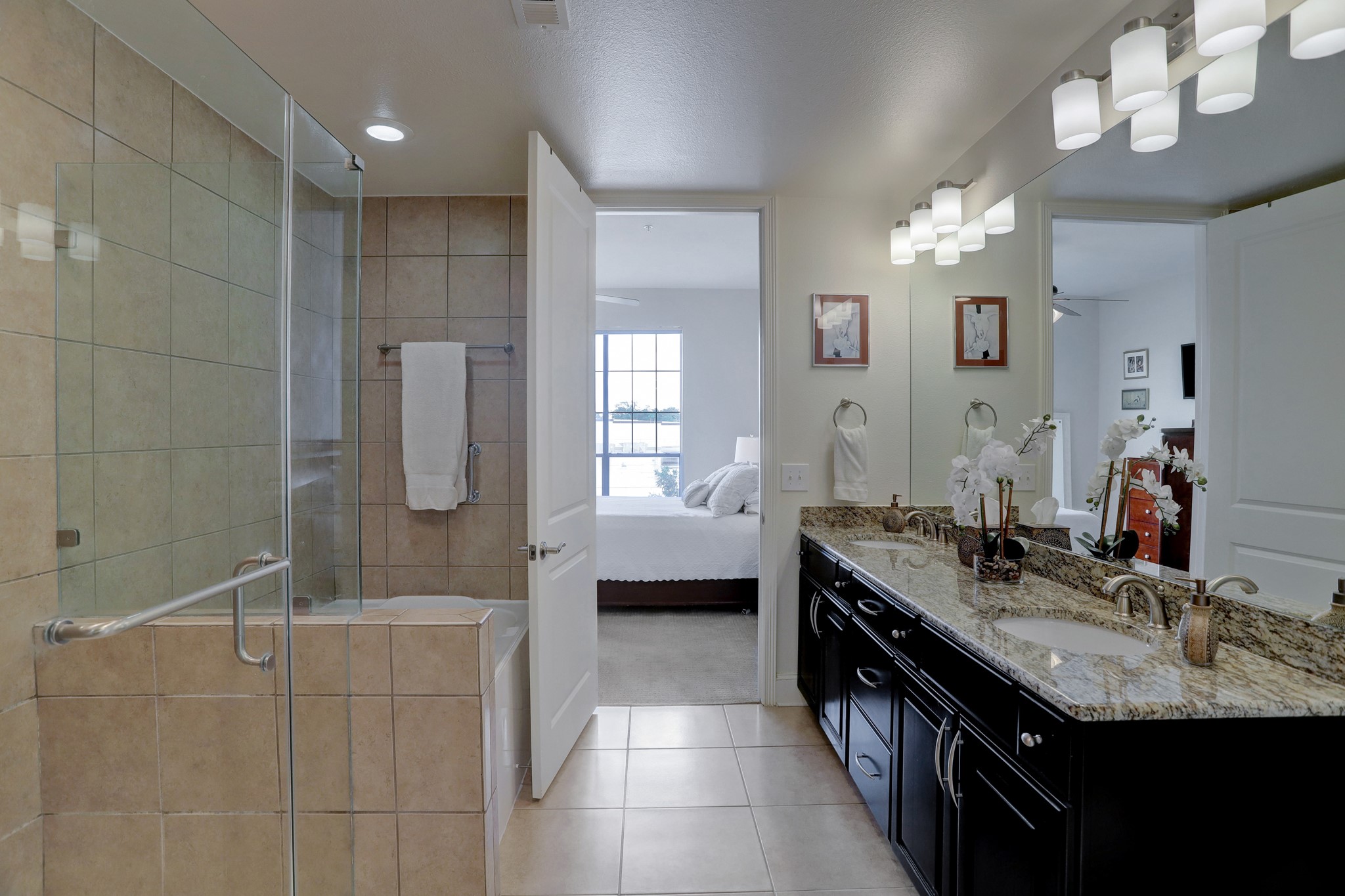 A double vanity and plenty of counter space in this well-appointed bathroom. - If you have additional questions regarding 2120 Kipling Street  in Houston or would like to tour the property with us call 800-660-1022 and reference MLS# 20665105.