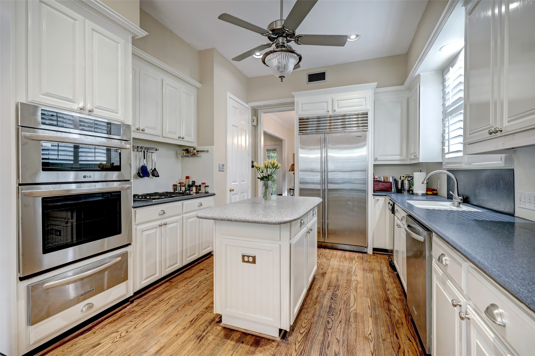 The open, spacious island kitchen has new stainless oven and microwave, all stainless appliances and lots of storage space. - If you have additional questions regarding 2918 Mid Lane  in Houston or would like to tour the property with us call 800-660-1022 and reference MLS# 60339156.