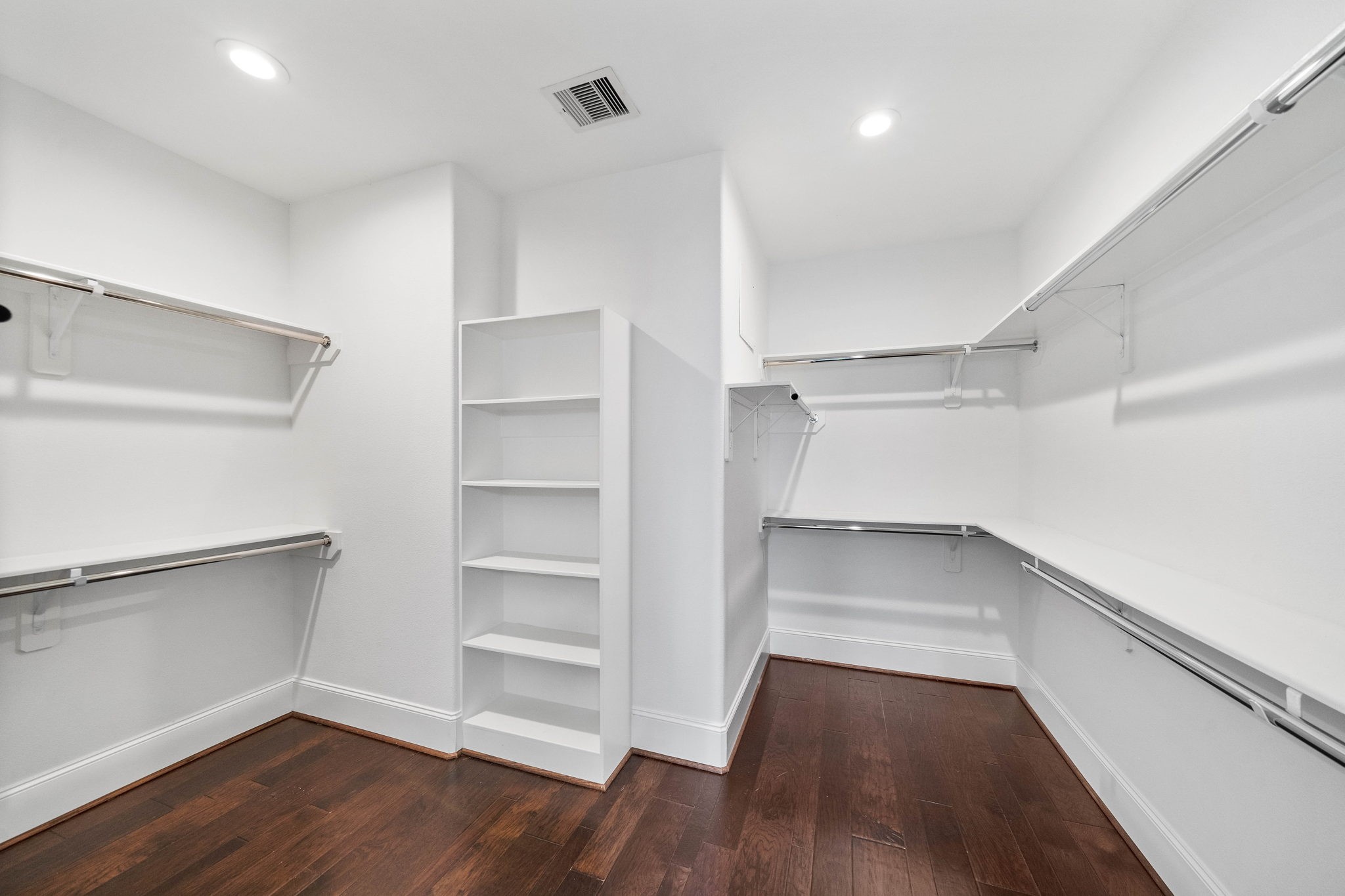you will love this spacious walk-in closet with hanging rods and customized shelves. - If you have additional questions regarding 2433 Dorrington Street  in Houston or would like to tour the property with us call 800-660-1022 and reference MLS# 30508451.