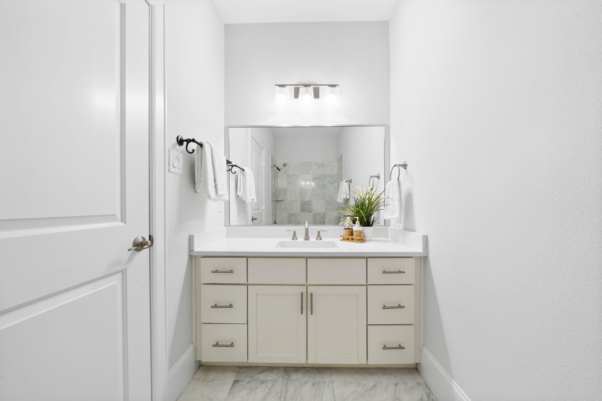 single vanity bathroom with lots of storage. - If you have additional questions regarding 2433 Dorrington Street  in Houston or would like to tour the property with us call 800-660-1022 and reference MLS# 30508451.