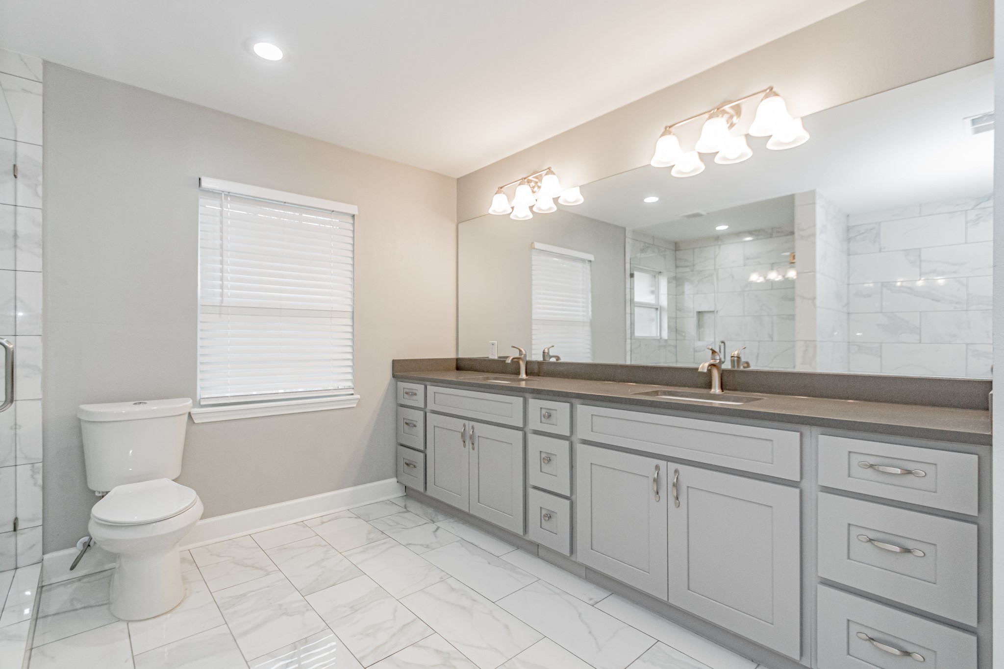 Primary bathroom - If you have additional questions regarding 10306 Willowisp Drive  in Houston or would like to tour the property with us call 800-660-1022 and reference MLS# 48587210.