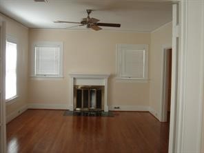 mock fireplace in living room - If you have additional questions regarding 1900 Lexington Street  in Houston or would like to tour the property with us call 800-660-1022 and reference MLS# 28408716.