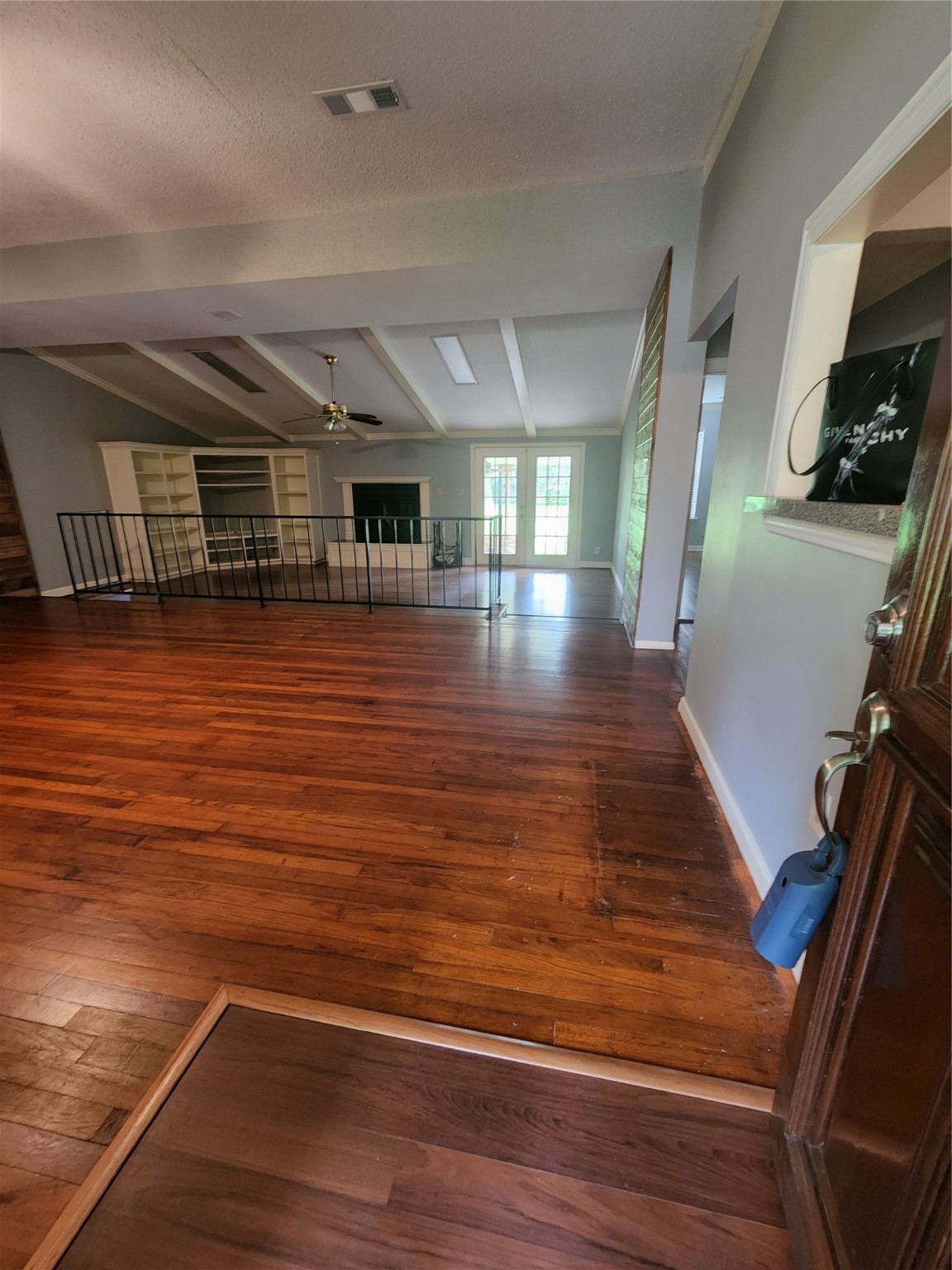 Entrance Enters in Upper Level with Sunken Entertainment Room with Fireplace & Built-In Entertainment Center. - If you have additional questions regarding 9310 Carousel Lane  in Houston or would like to tour the property with us call 800-660-1022 and reference MLS# 44011019.