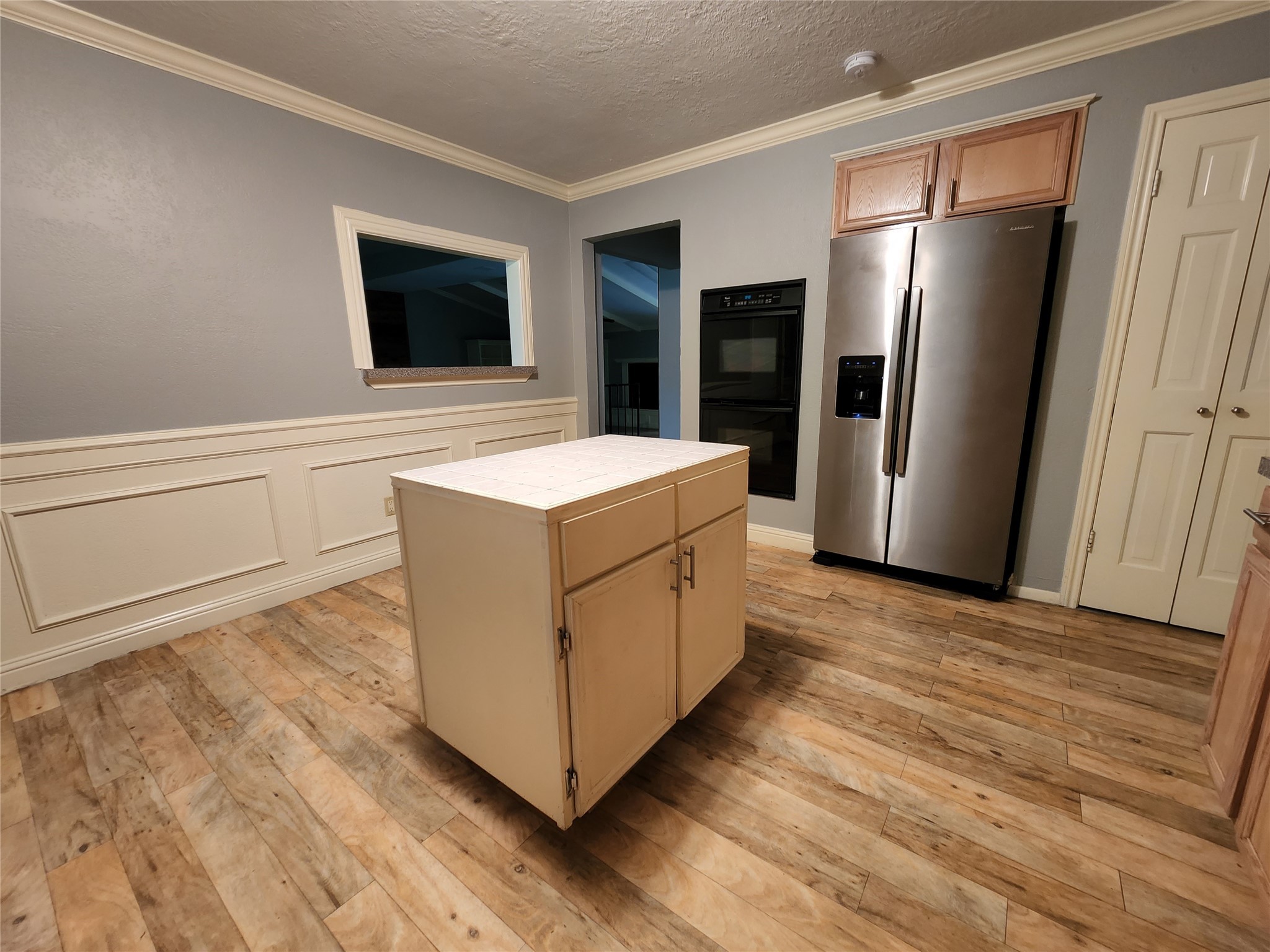 Kitchen Nook with Island - If you have additional questions regarding 9310 Carousel Lane  in Houston or would like to tour the property with us call 800-660-1022 and reference MLS# 44011019.