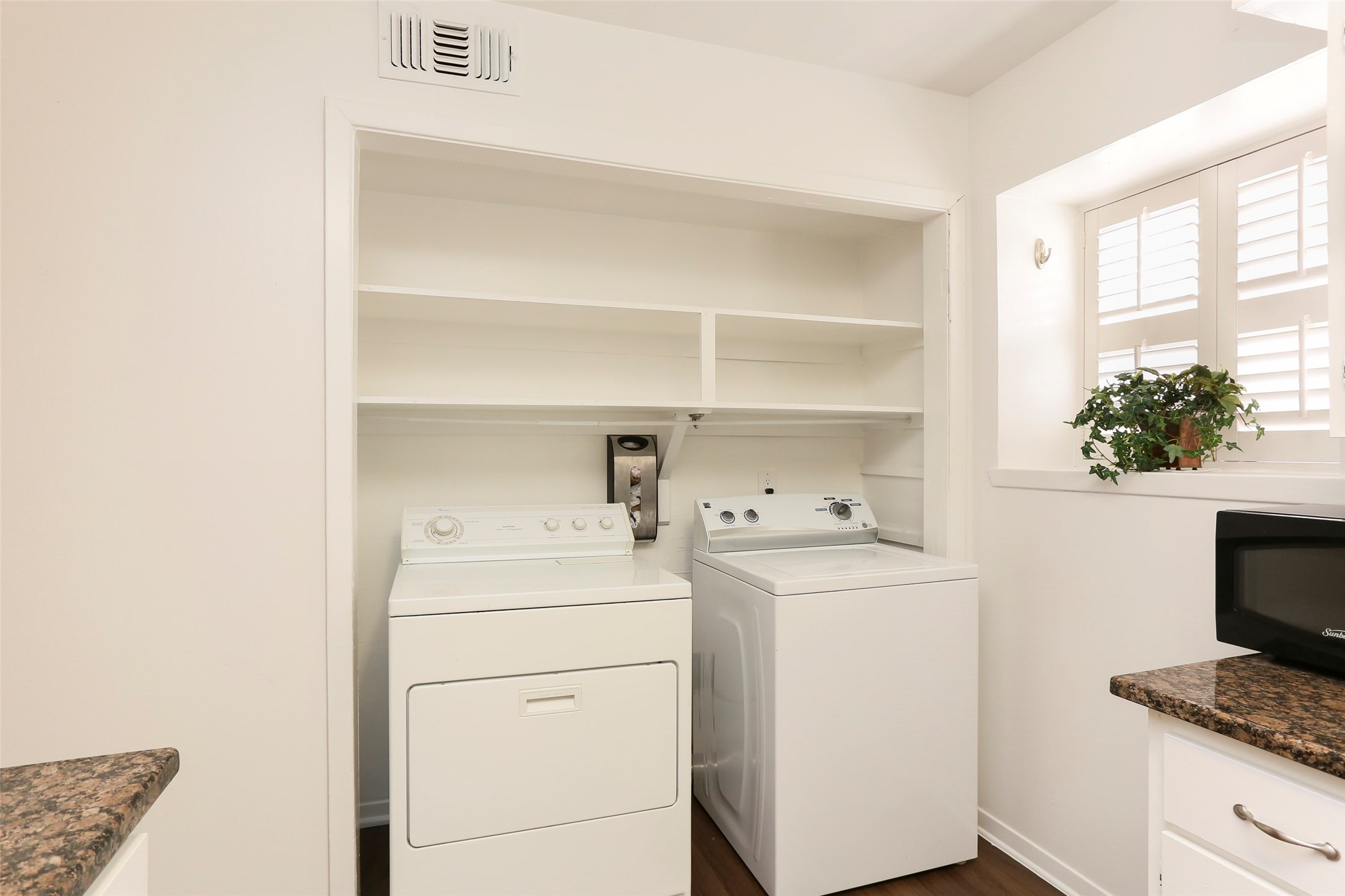 This photo is better at reflecting the space in the kitchen and laundry area. - If you have additional questions regarding 9017 Gaylord Drive  in Houston or would like to tour the property with us call 800-660-1022 and reference MLS# 73330240.