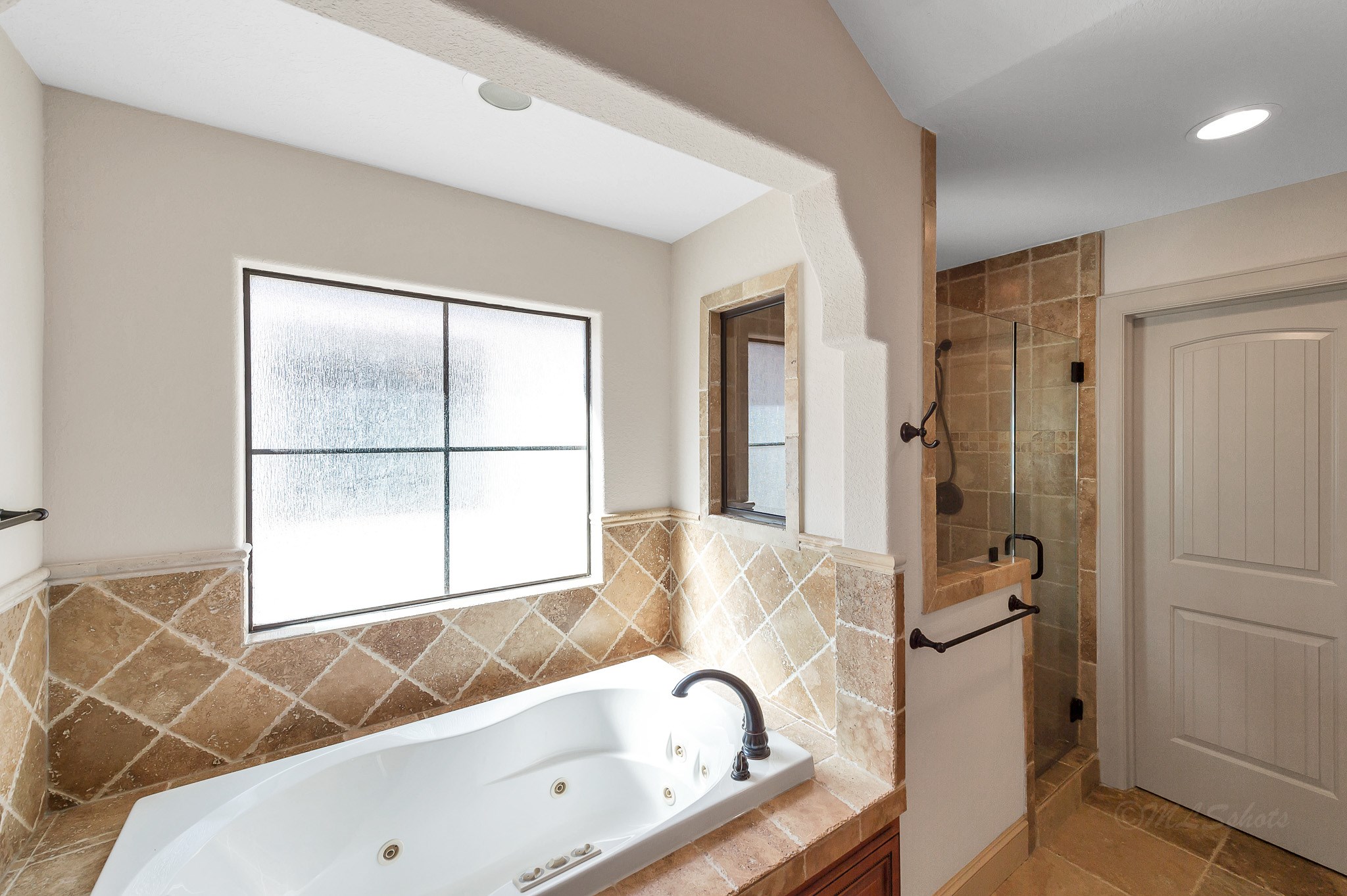 Relaxing jetted tub - If you have additional questions regarding 1802 W 25th Street  in Houston or would like to tour the property with us call 800-660-1022 and reference MLS# 40510928.