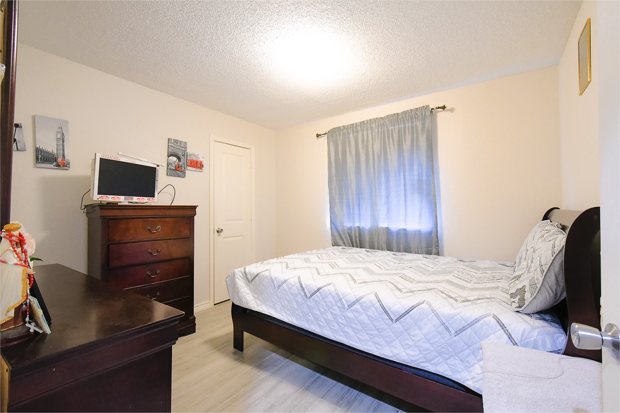 Bedroom 2 - If you have additional questions regarding 6606 Lewiston Street  in Houston or would like to tour the property with us call 800-660-1022 and reference MLS# 50311995.