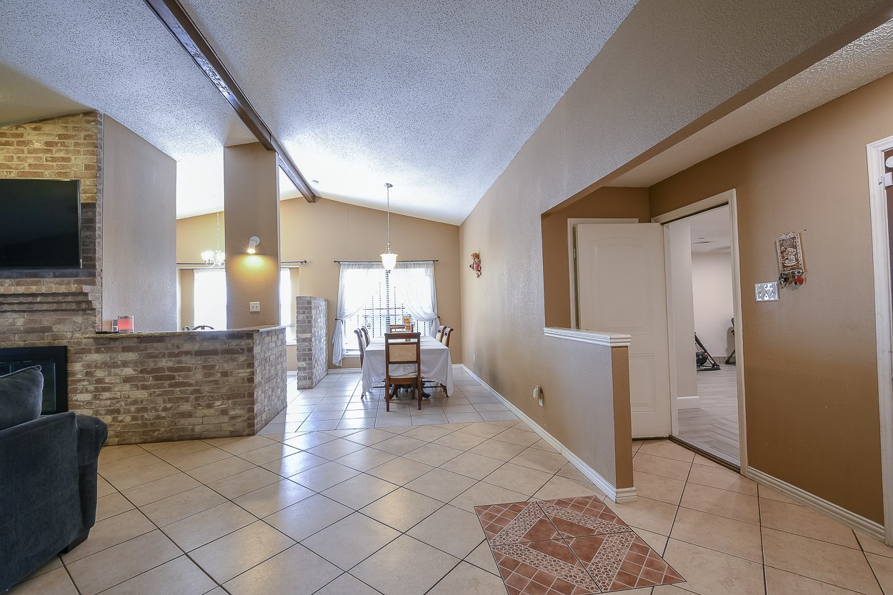 View form the front door looking to the formal dining and living room - If you have additional questions regarding 6606 Lewiston Street  in Houston or would like to tour the property with us call 800-660-1022 and reference MLS# 50311995.