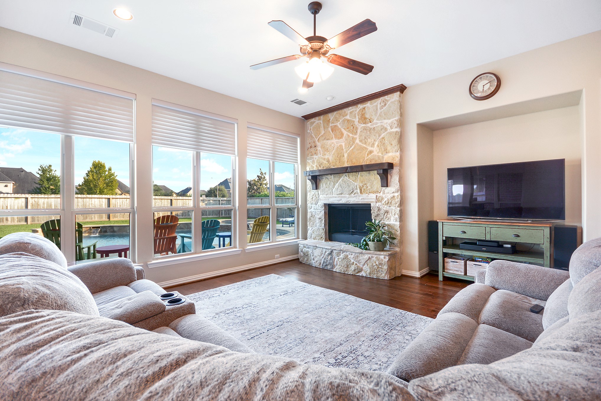 Large living looks out onto the beautiful pool and patio - If you have additional questions regarding 27827 Walsh Crossing Drive  in Katy or would like to tour the property with us call 800-660-1022 and reference MLS# 49318095.