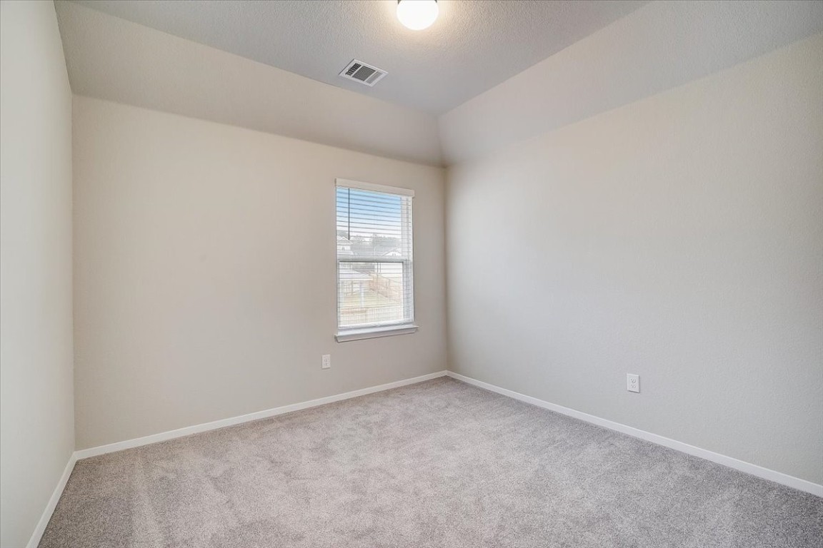 Guest bedroom 1: Three well-sized secondary bedrooms provide ample space for family or guests - If you have additional questions regarding 5629 Respinto Drive  in Austin or would like to tour the property with us call 800-660-1022 and reference MLS# 8807124.