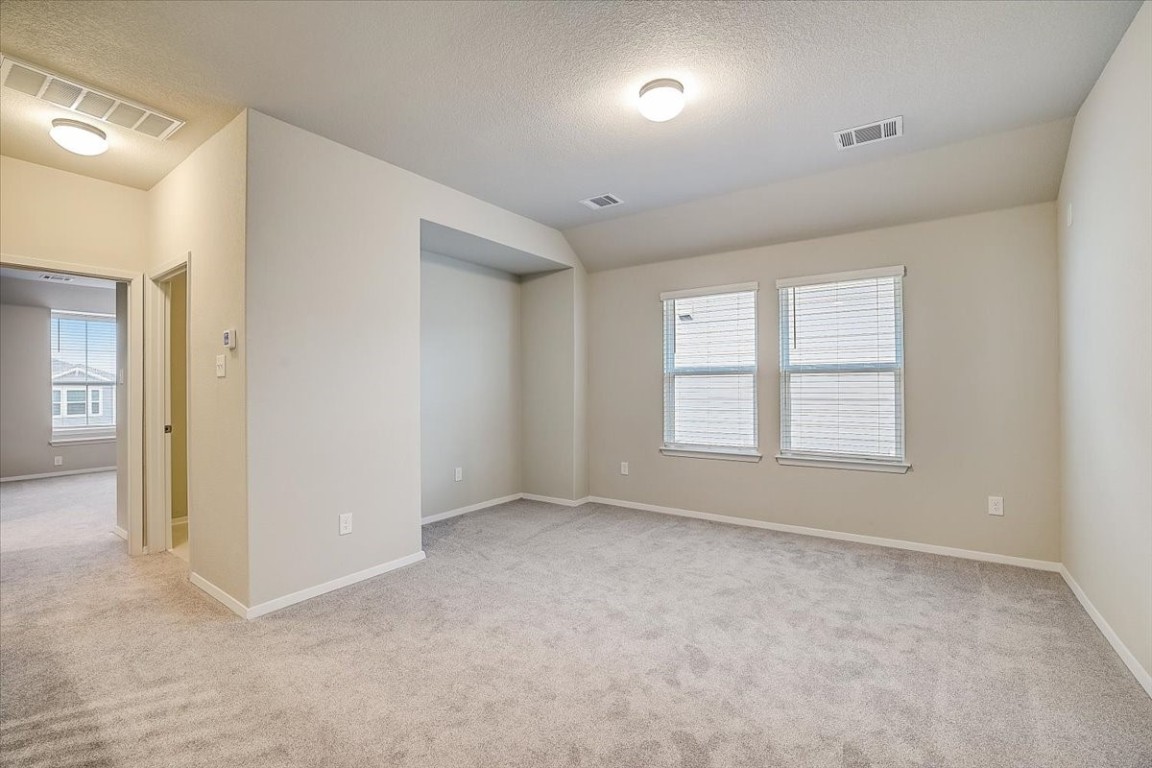 Game room: A large game room/secondary living area upstairs is perfect for movie nights or game nights. - If you have additional questions regarding 5629 Respinto Drive  in Austin or would like to tour the property with us call 800-660-1022 and reference MLS# 8807124.