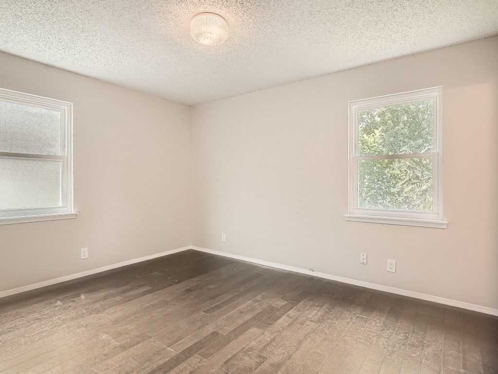 Primary bedroom - If you have additional questions regarding 209 E Longspur Boulevard  in Austin or would like to tour the property with us call 800-660-1022 and reference MLS# 5555850.