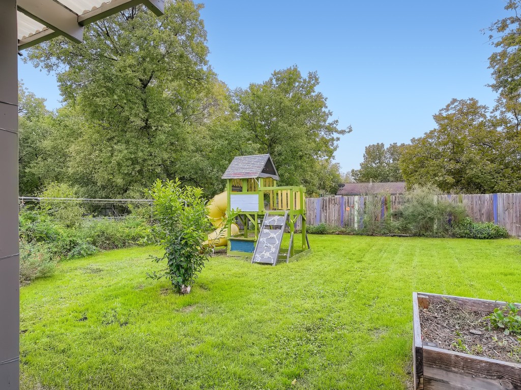Back yard - If you have additional questions regarding 209 E Longspur Boulevard  in Austin or would like to tour the property with us call 800-660-1022 and reference MLS# 5555850.