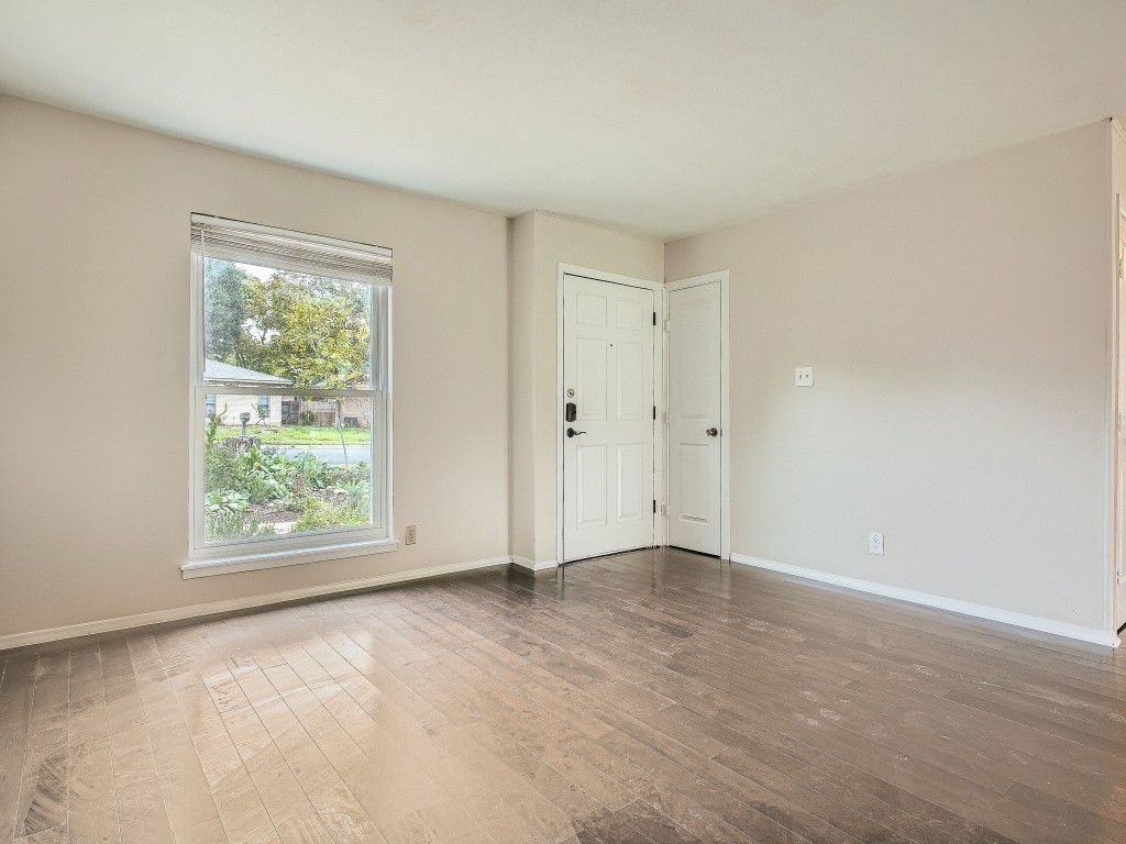 Family room - If you have additional questions regarding 209 E Longspur Boulevard  in Austin or would like to tour the property with us call 800-660-1022 and reference MLS# 5555850.
