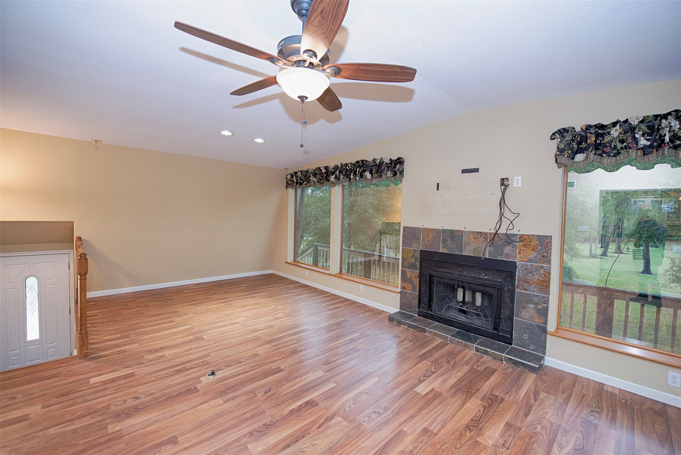 The family room area features a wonderful fireplace surrounded by slate. A great spot to cozy around during the cooler months. - If you have additional questions regarding 1028 N Country Club Drive  in Shoreacres or would like to tour the property with us call 800-660-1022 and reference MLS# 5487846.