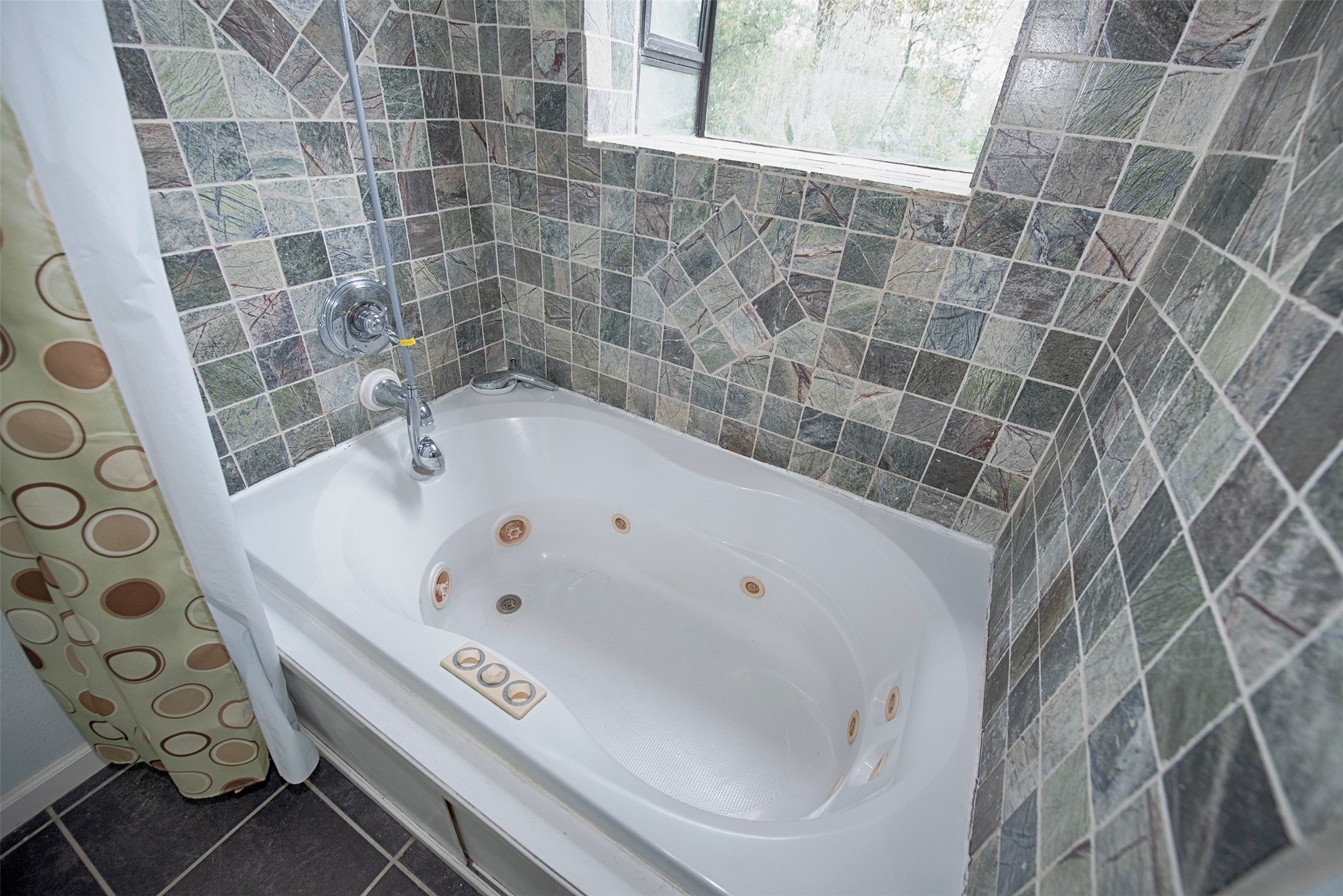 Bathroom also provides a wonderful Jacuzzi tub with overhead shower as well. - If you have additional questions regarding 1028 N Country Club Drive  in Shoreacres or would like to tour the property with us call 800-660-1022 and reference MLS# 5487846.