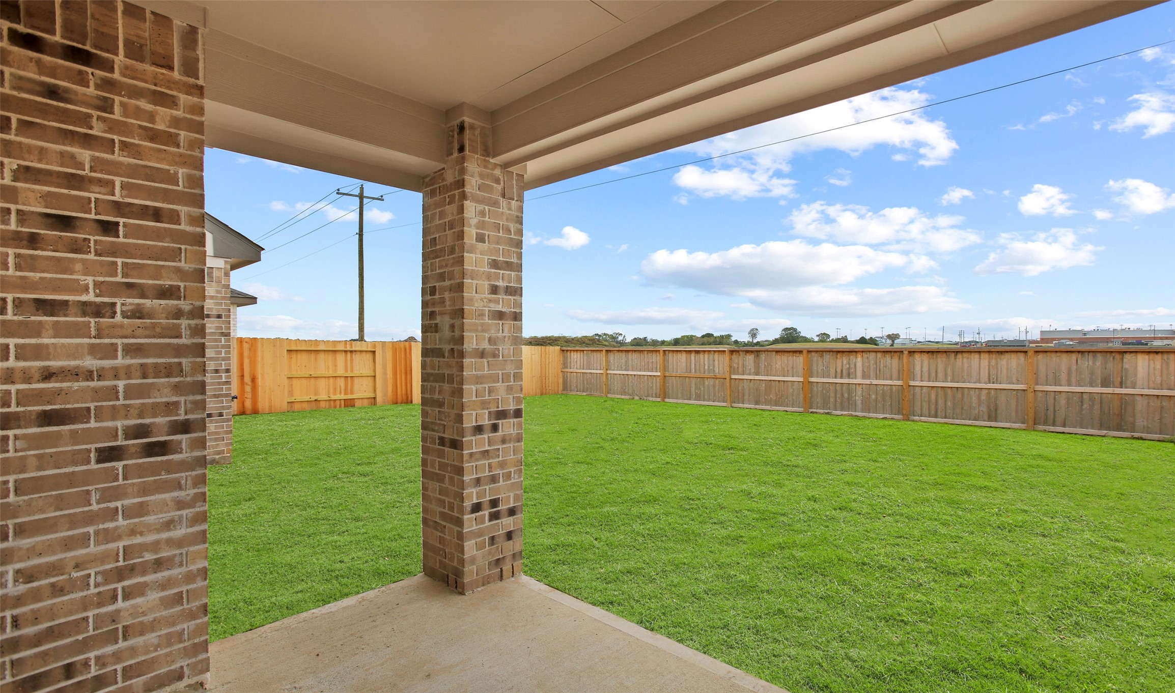 Covered patio in backyard - If you have additional questions regarding 3323 Brushy Meadow Drive  in Angleton or would like to tour the property with us call 800-660-1022 and reference MLS# 22660160.