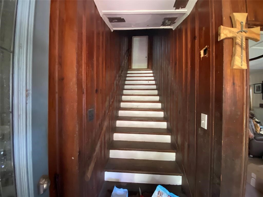 Entry to the property. Upstairs would lead to the 2nd unit that is identical to the 1st floor unit. - If you have additional questions regarding 7724 Camwood Street  in Houston or would like to tour the property with us call 800-660-1022 and reference MLS# 26127433.
