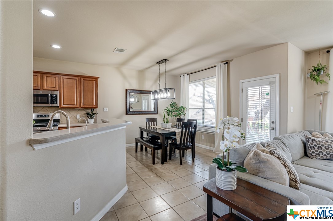 Kitchen/Living - If you have additional questions regarding 25615 Spirea  in San Antonio or would like to tour the property with us call 800-660-1022 and reference MLS# 496563.