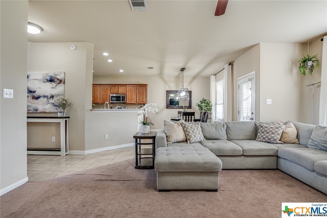 Kitchen/Living - If you have additional questions regarding 25615 Spirea  in San Antonio or would like to tour the property with us call 800-660-1022 and reference MLS# 496563.