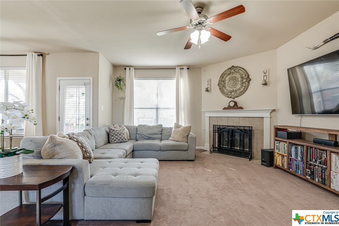 Living Room/Fireplace - If you have additional questions regarding 25615 Spirea  in San Antonio or would like to tour the property with us call 800-660-1022 and reference MLS# 496563.