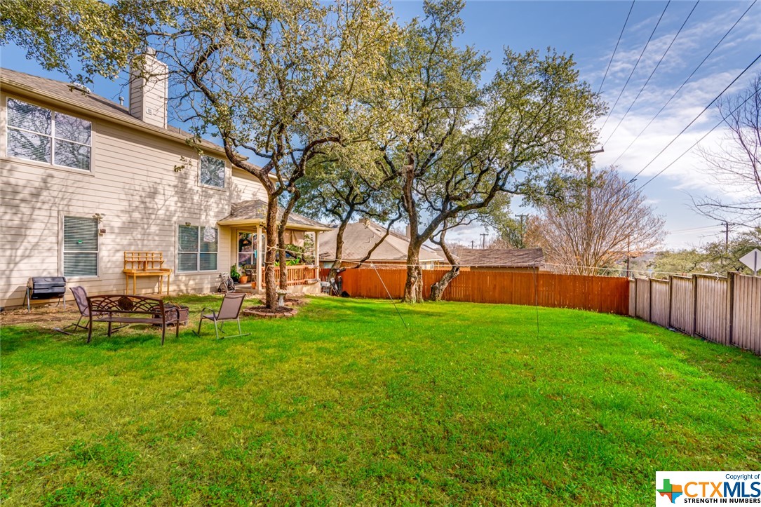 Backyard - If you have additional questions regarding 25615 Spirea  in San Antonio or would like to tour the property with us call 800-660-1022 and reference MLS# 496563.