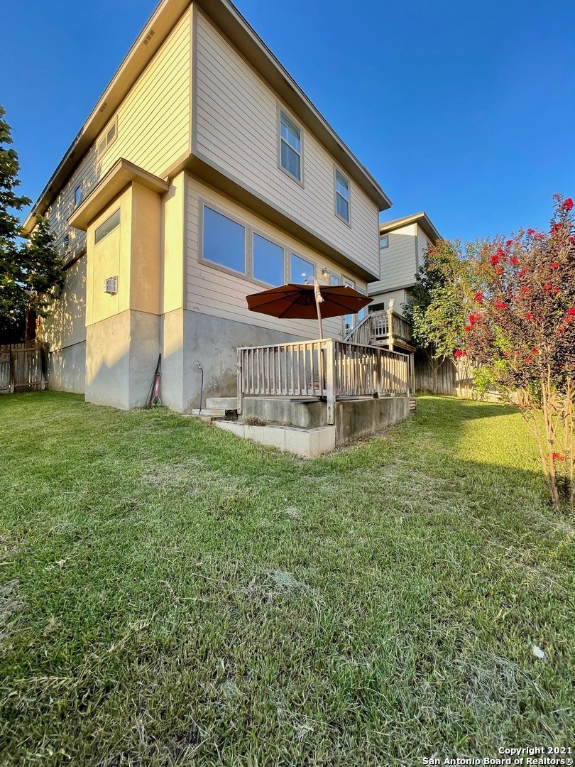 BAck Yard/with Patio - If you have additional questions regarding 1210 Nicholas Manor  in San Antonio or would like to tour the property with us call 800-660-1022 and reference MLS# 2389638.