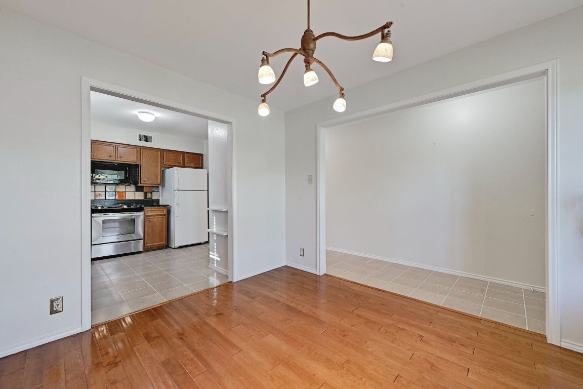 Dining into kitchen - If you have additional questions regarding 3601 Bliss Spillar Road  in Manchaca or would like to tour the property with us call 800-660-1022 and reference MLS# 8234670.