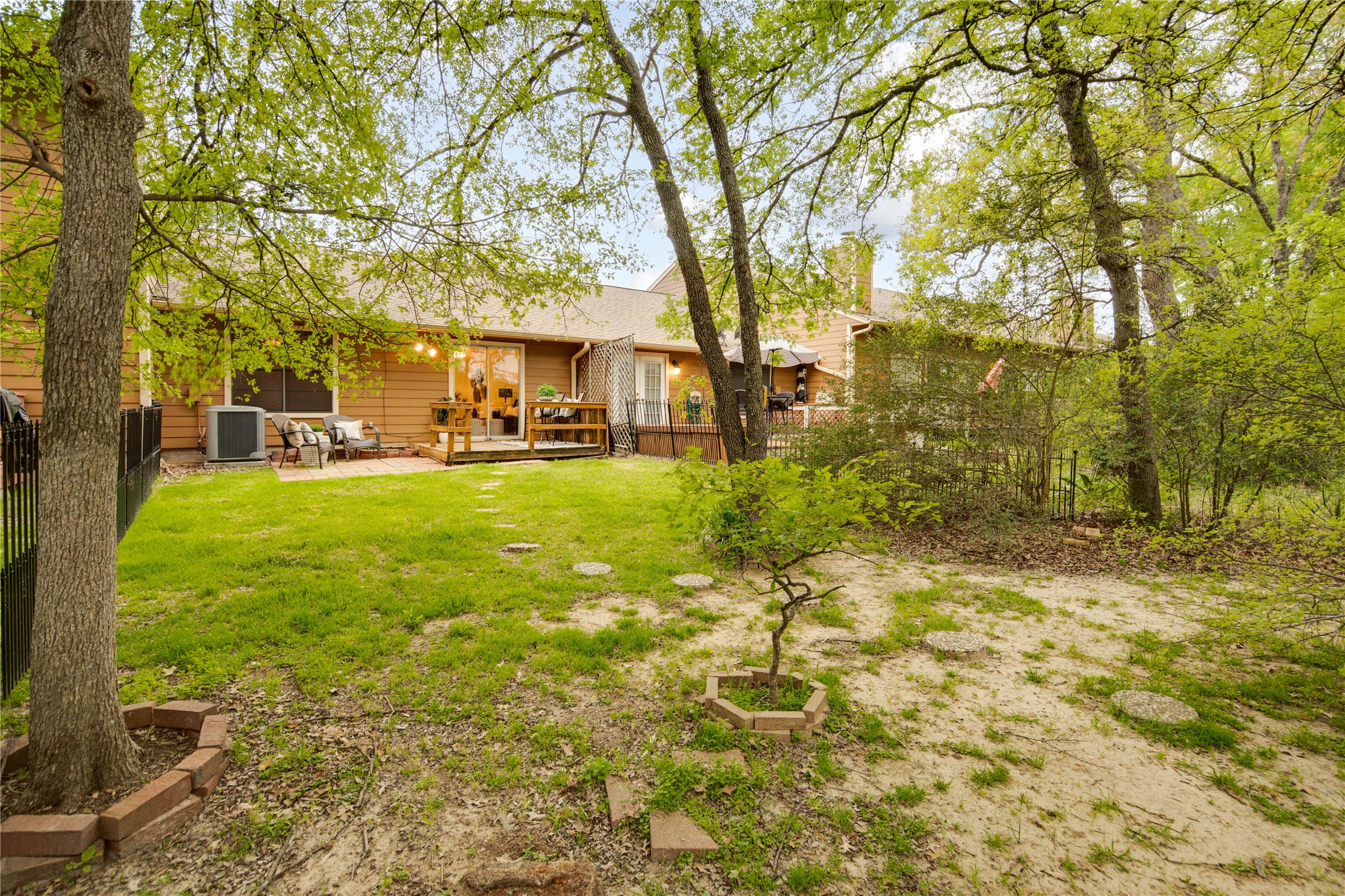 Spacious yard - If you have additional questions regarding 2835 Oakside Drive  in Bryan or would like to tour the property with us call 800-660-1022 and reference MLS# 38572652.