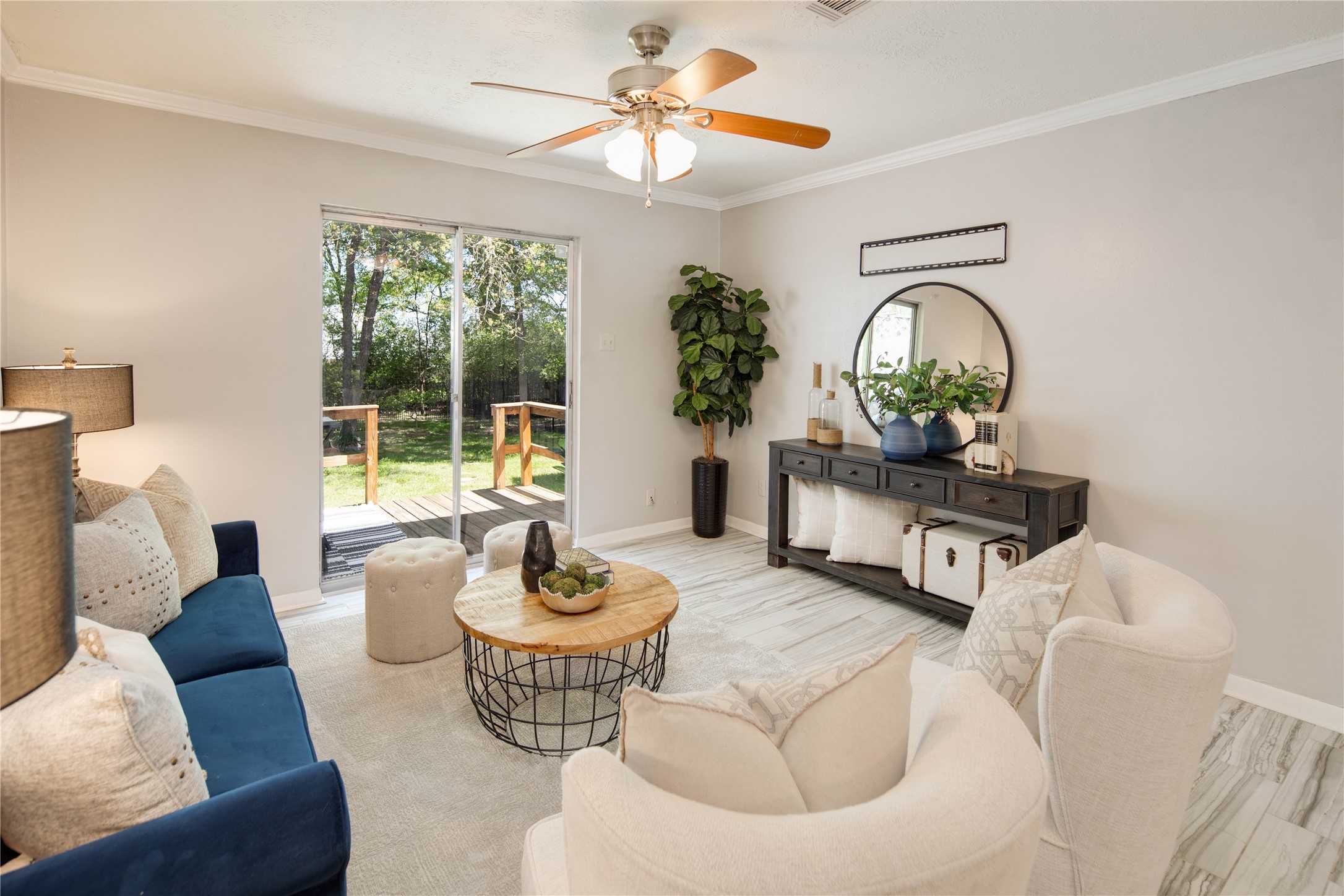 Bright living area with deck access - If you have additional questions regarding 2835 Oakside Drive  in Bryan or would like to tour the property with us call 800-660-1022 and reference MLS# 38572652.
