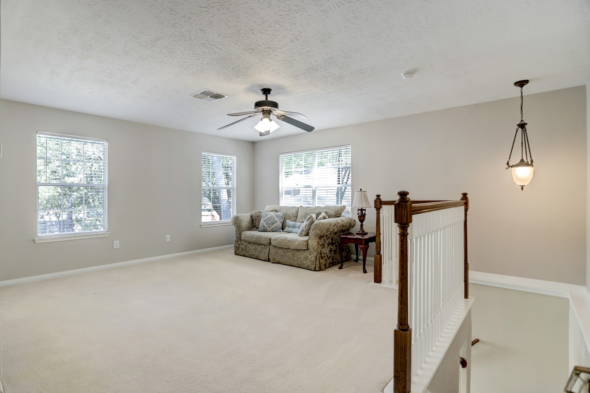 Large game room at the top of the second staircase - If you have additional questions regarding 3802 Sweetgum Hill Lane  in Kingwood or would like to tour the property with us call 800-660-1022 and reference MLS# 86677808.