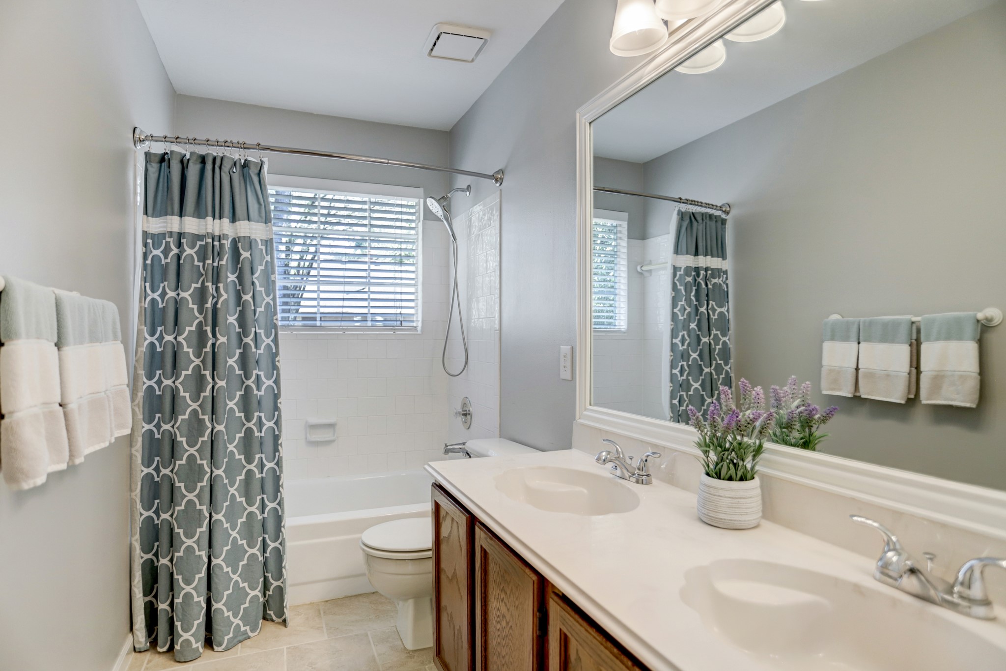 Second bathroom - If you have additional questions regarding 3802 Sweetgum Hill Lane  in Kingwood or would like to tour the property with us call 800-660-1022 and reference MLS# 86677808.