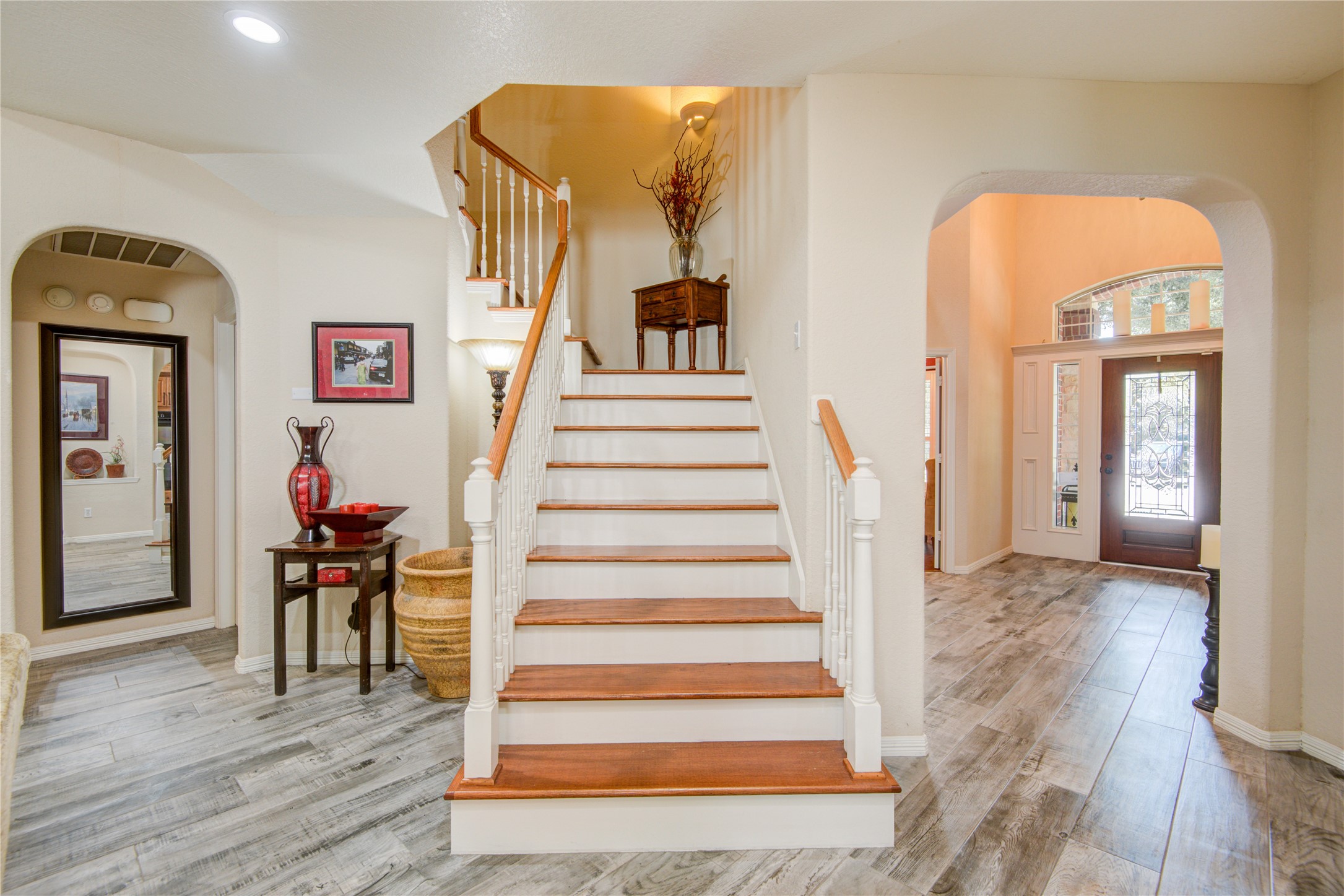 Wooden stairs leading to second level of the home. - If you have additional questions regarding 1111 Chelshurst Way  in Spring or would like to tour the property with us call 800-660-1022 and reference MLS# 54717444.