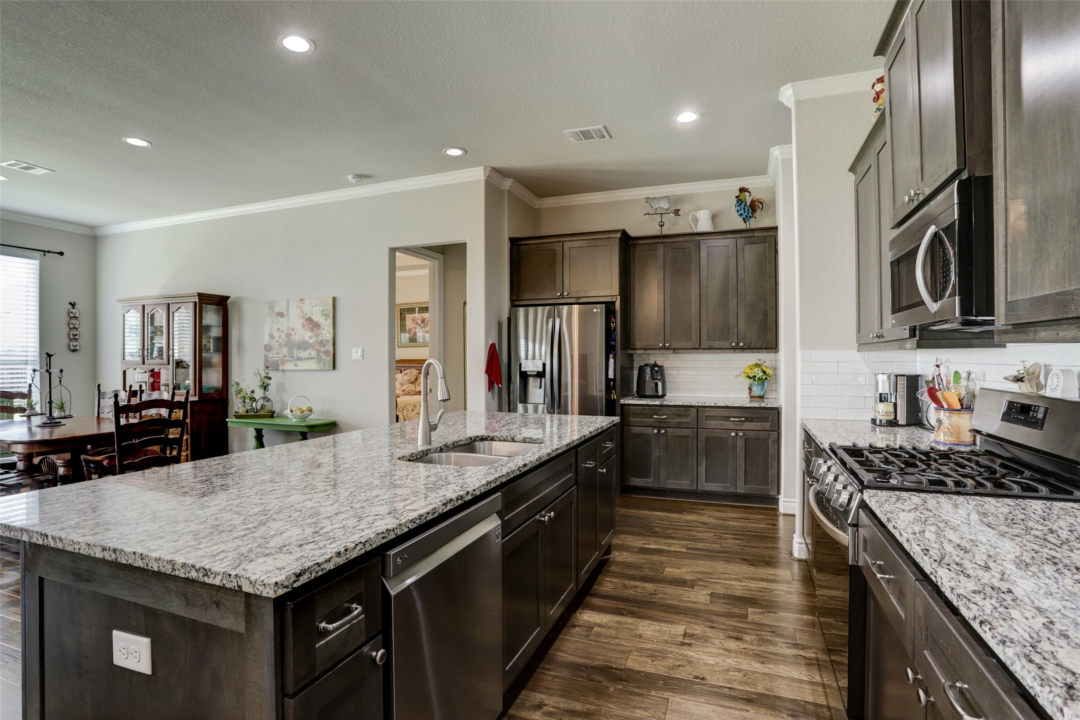 Large Kitchen Island - If you have additional questions regarding 409 Hunters Crossing Drive  in Sealy or would like to tour the property with us call 800-660-1022 and reference MLS# 67427616.